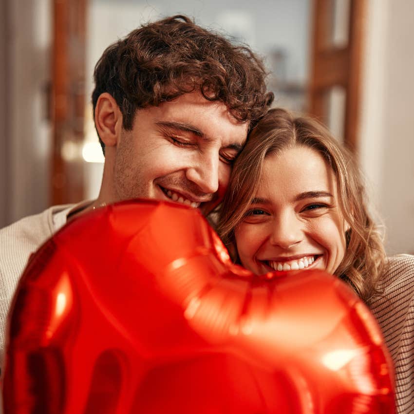 man using rare gesture of showing woman how he feels