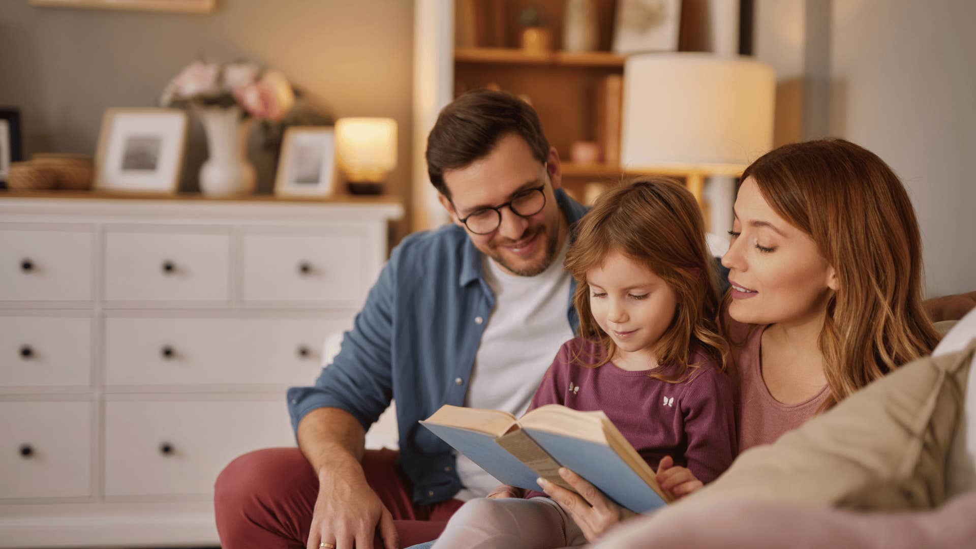 parents who are unforgettable to their kid reading a book with child