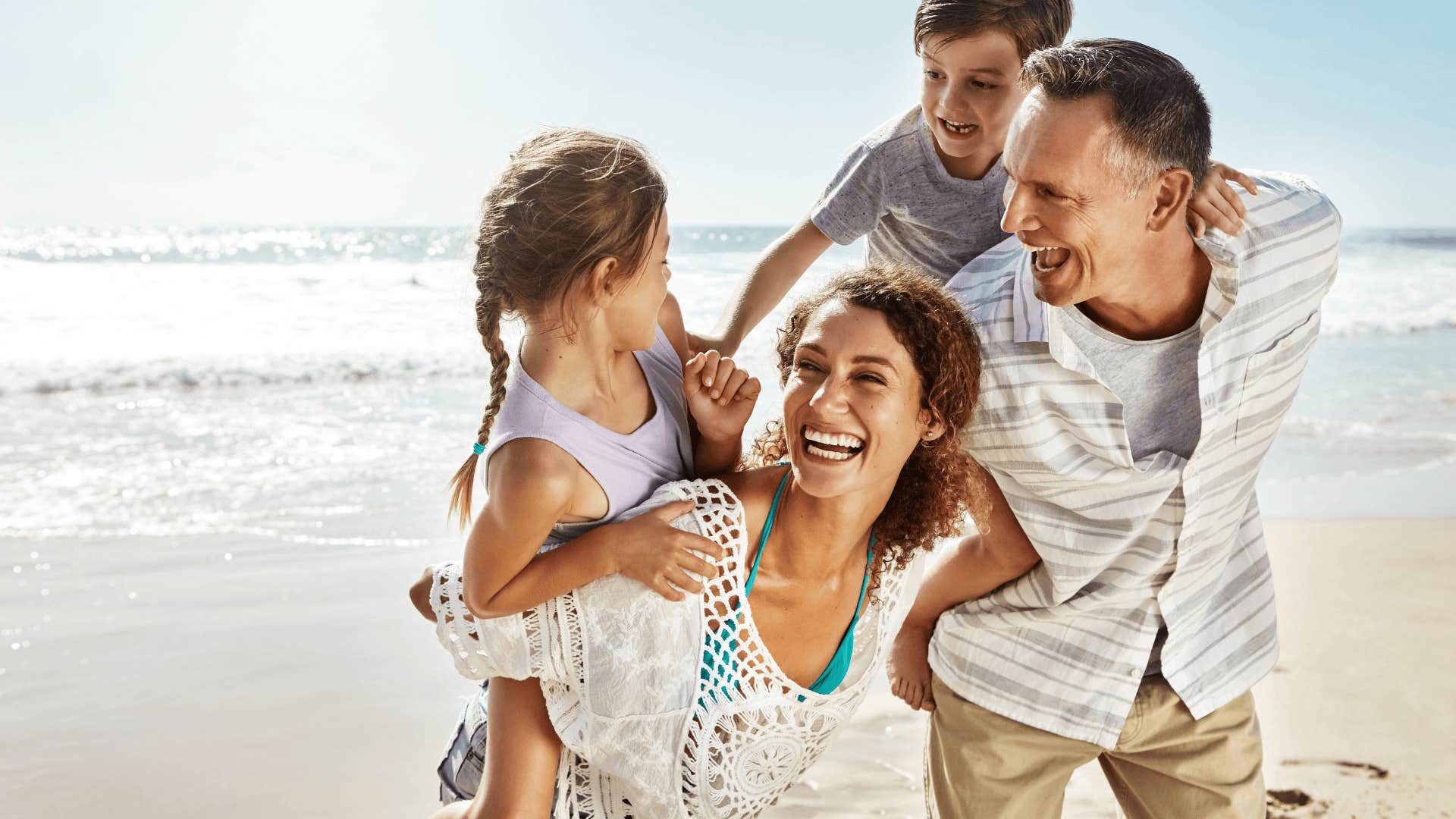 parents who are unforgettable to their kids on the beach