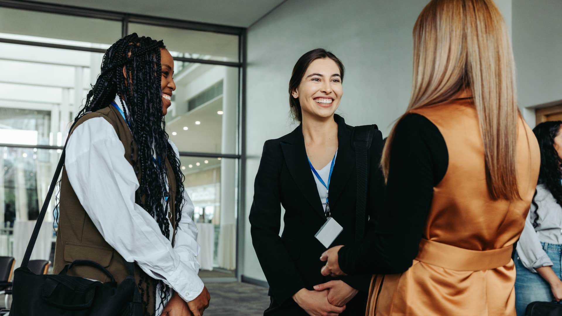 woman with rare qualities like loosening her shoulders that makes her more likeable