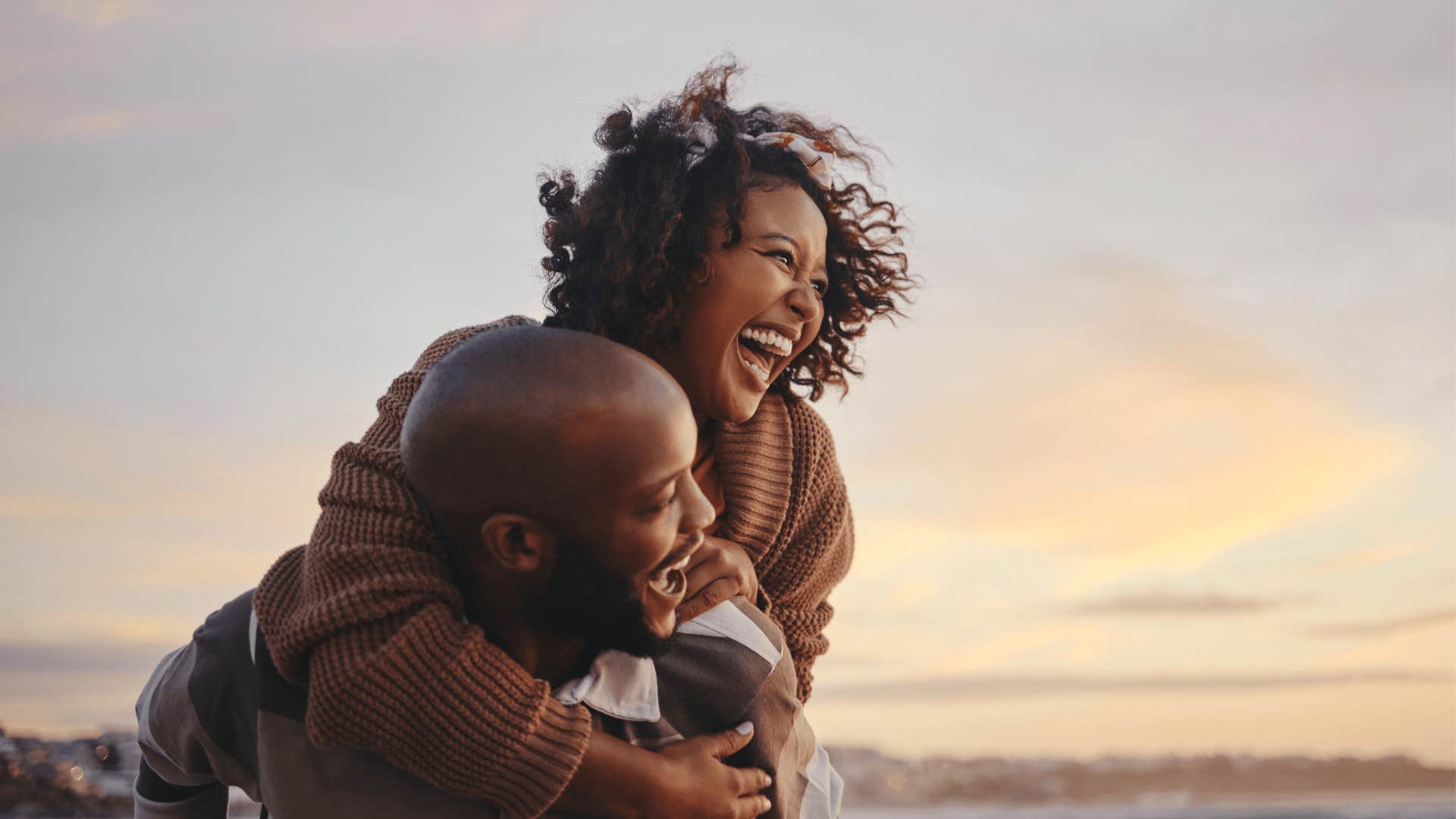 woman laughing who feels like home to men 