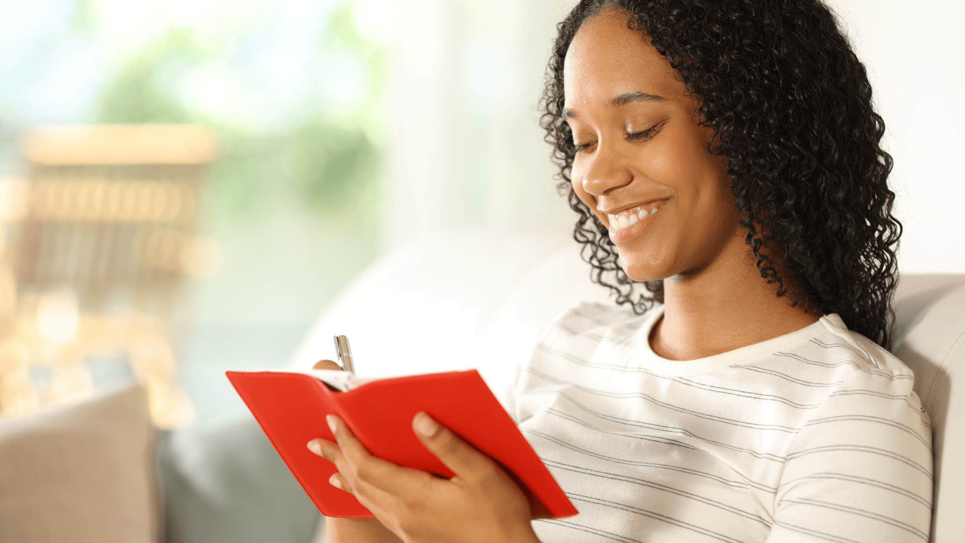 woman who is memorable to men writing in journal
