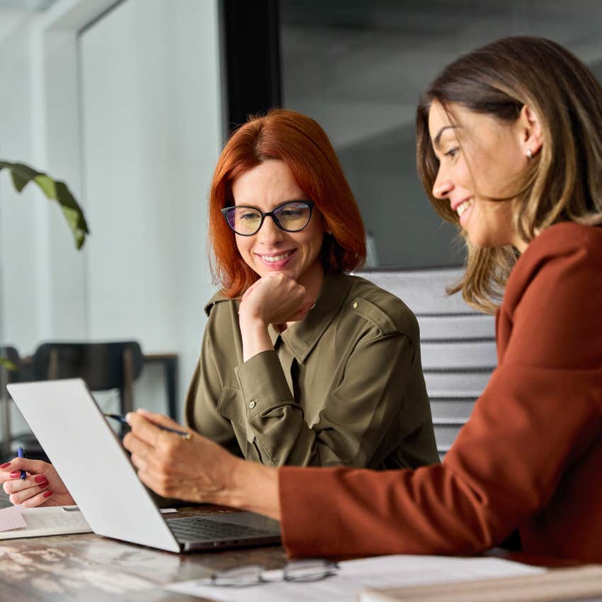 woman who is impossible to forget talking to coworker