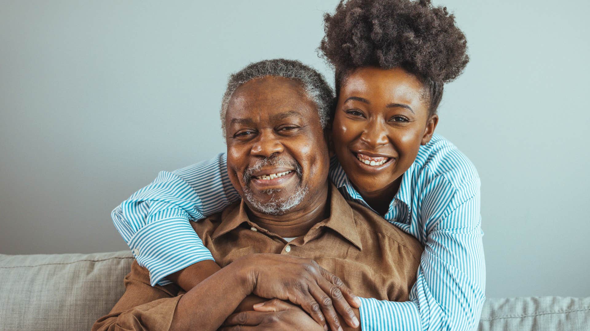 woman hugging father who showed her unconditional love