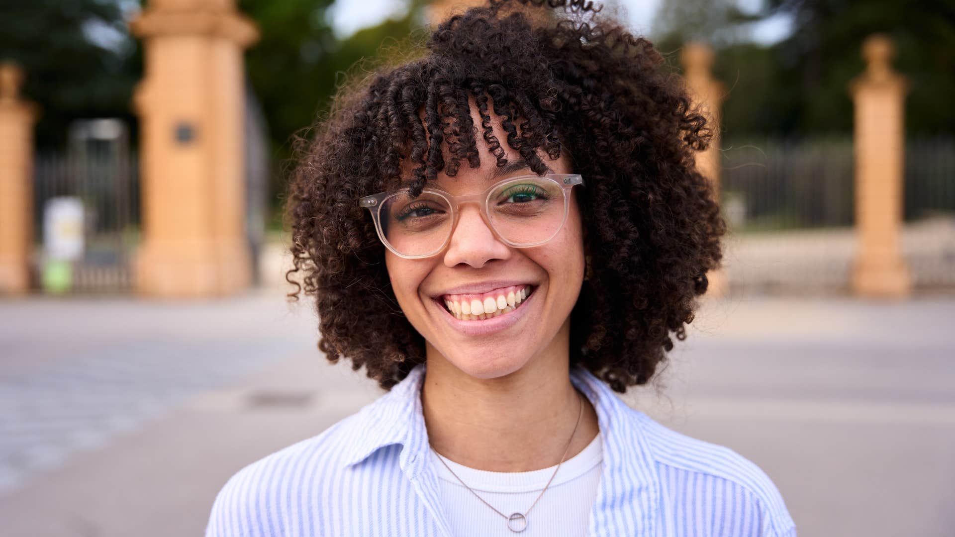 happy successful woman who was encouraged to pursue goals