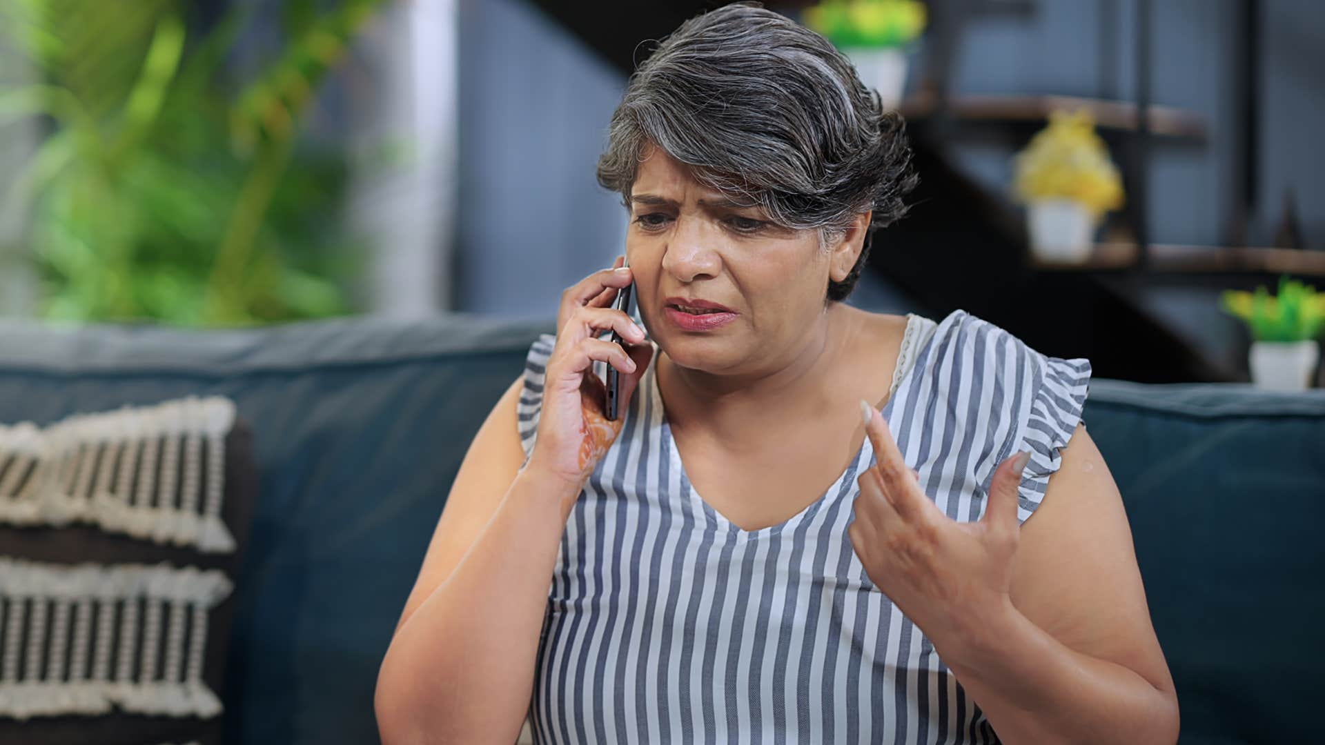 overly judgmental woman talking on the phone
