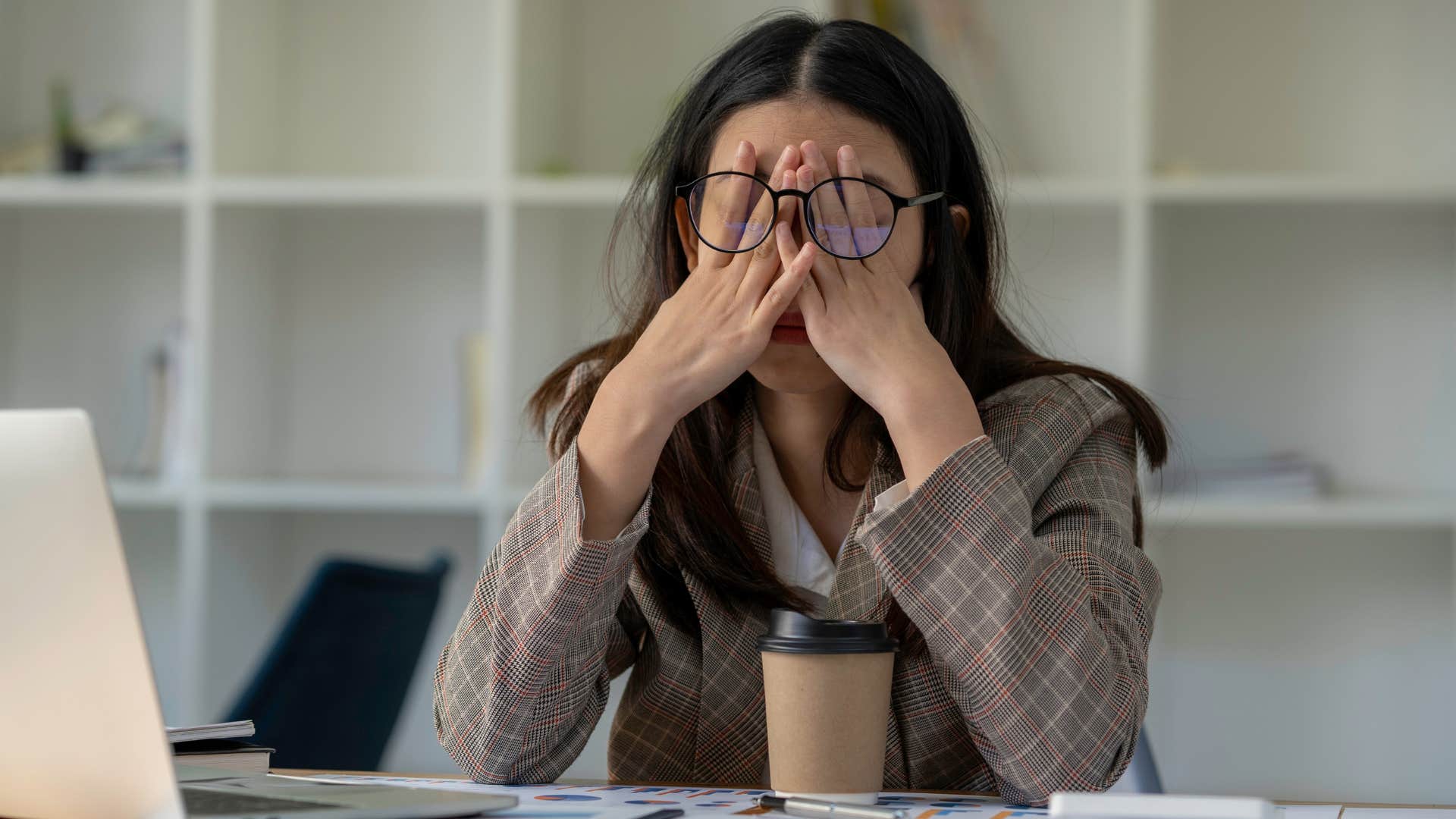 stressed millennial woman stuck in her job without purpose 
