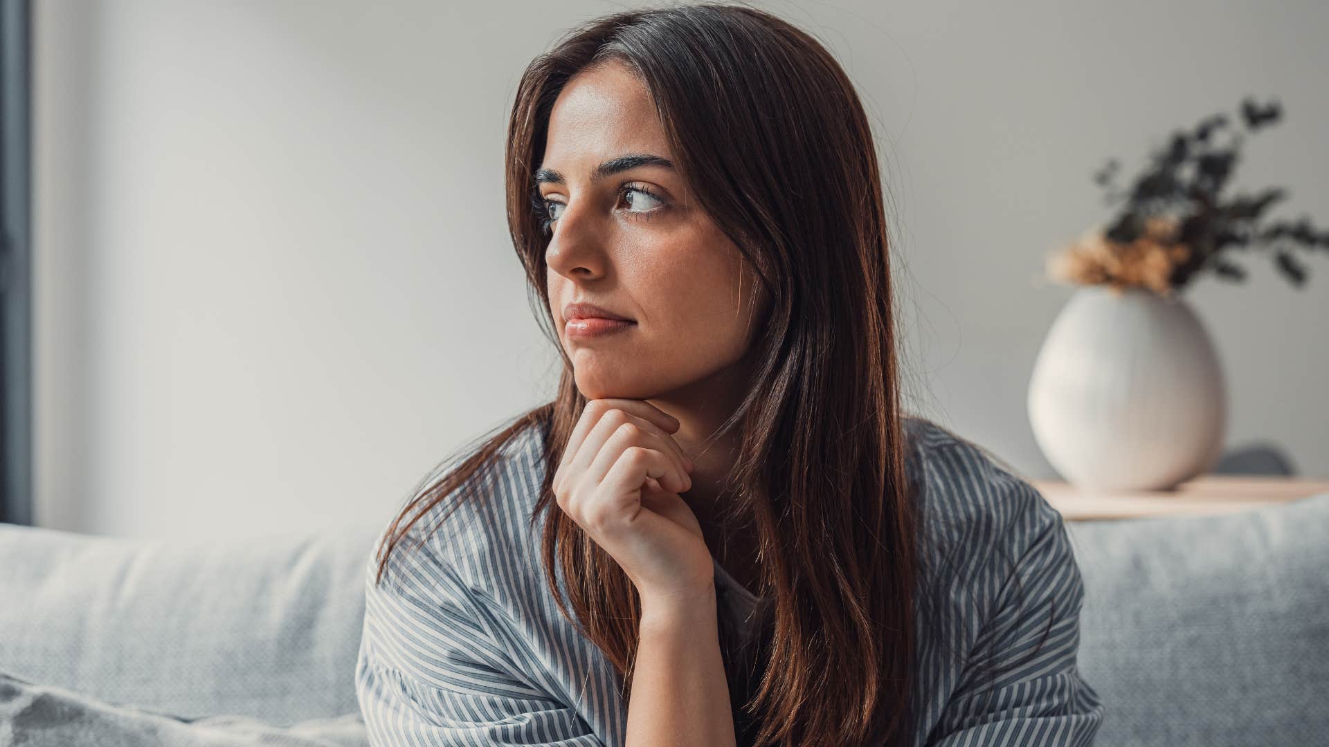 millennial woman looking detached