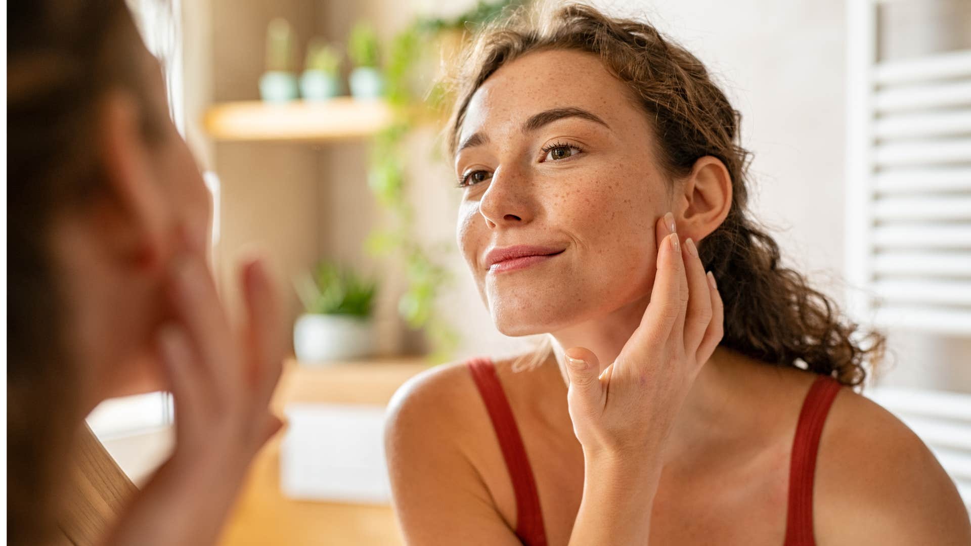 happy smiling millennial woman uninterested in changing her appearance