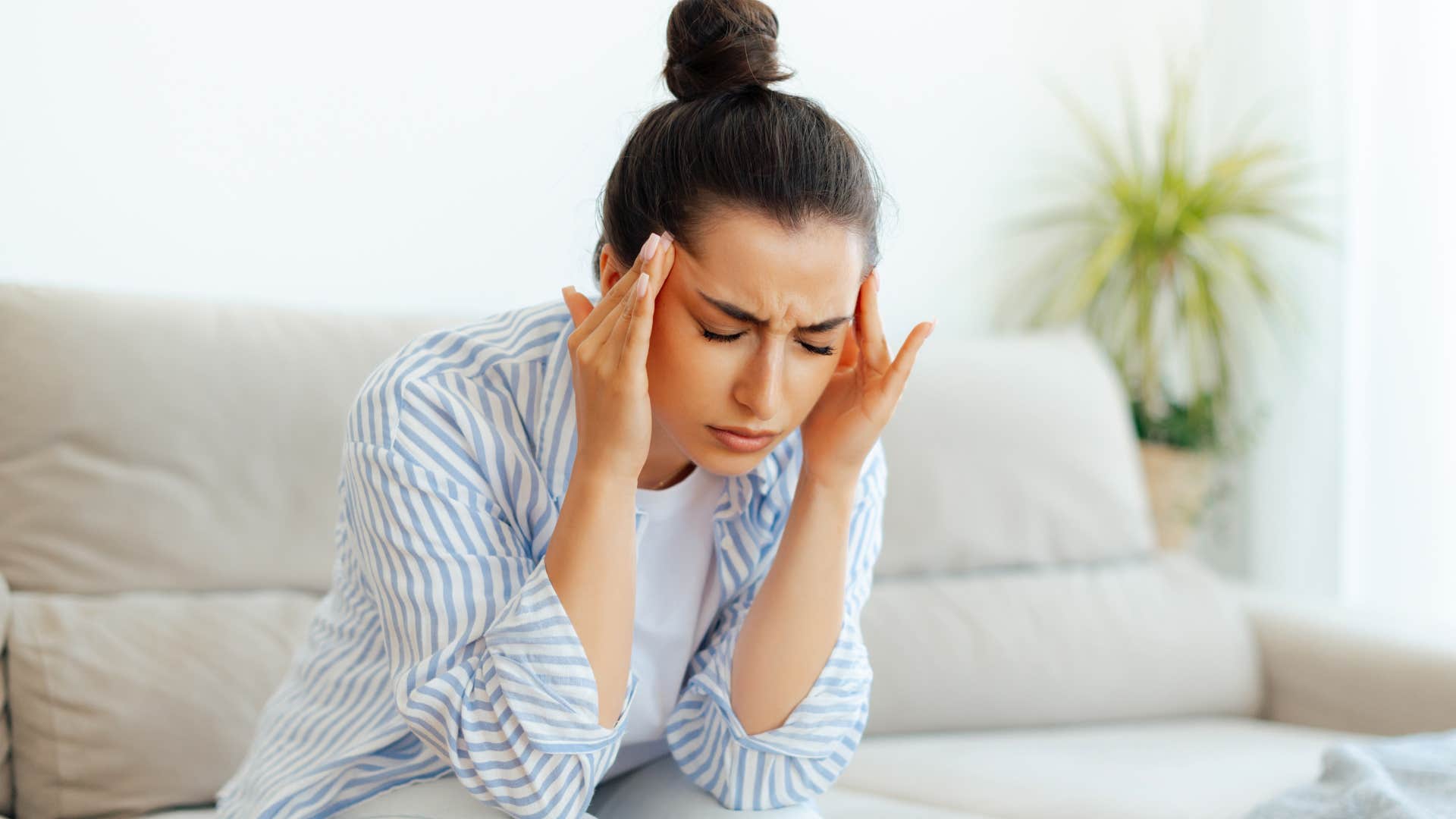 woman stressing over recognizing the early signs of a midlife crisis