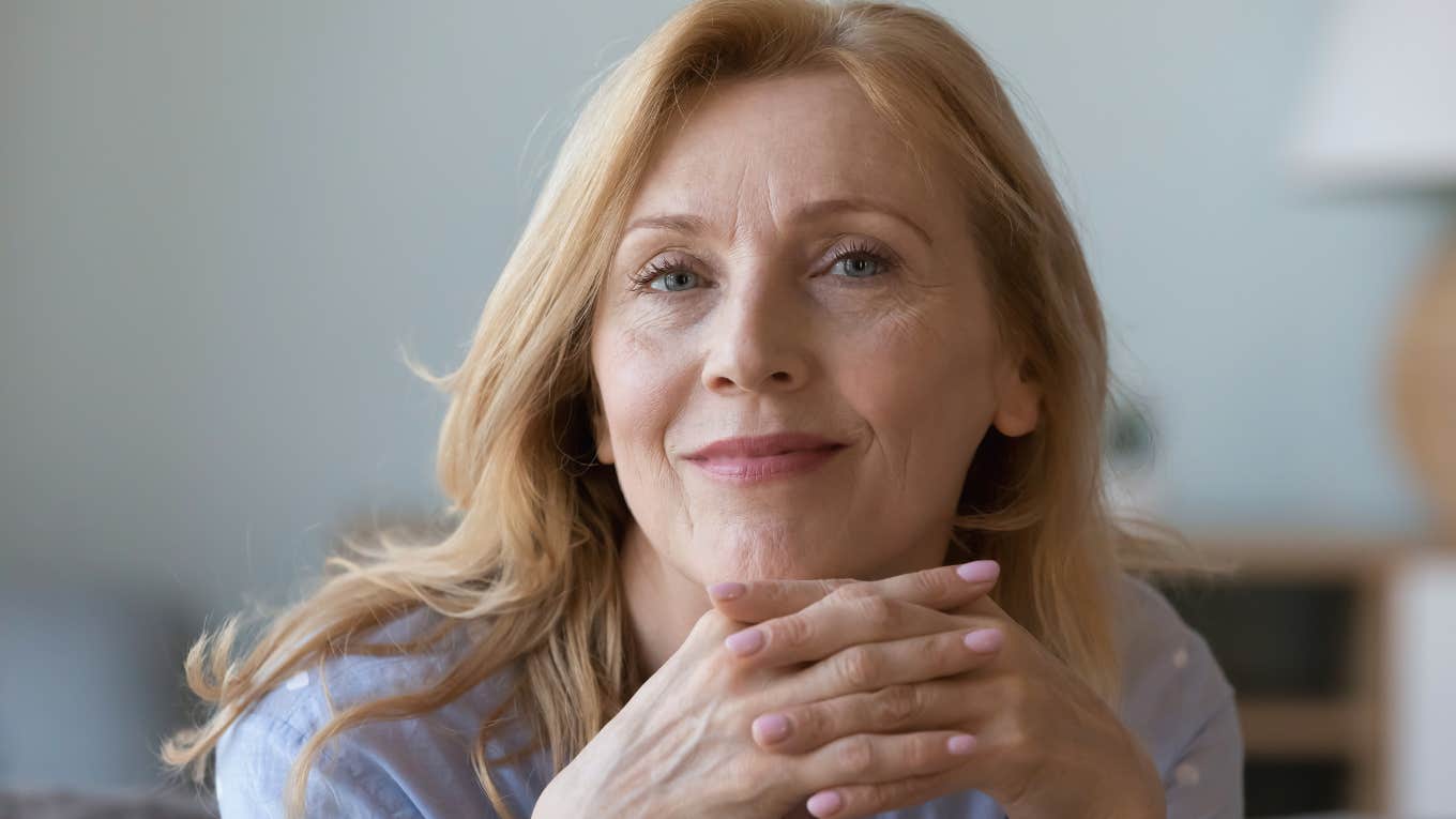 older woman smiling choosing peace over popularity