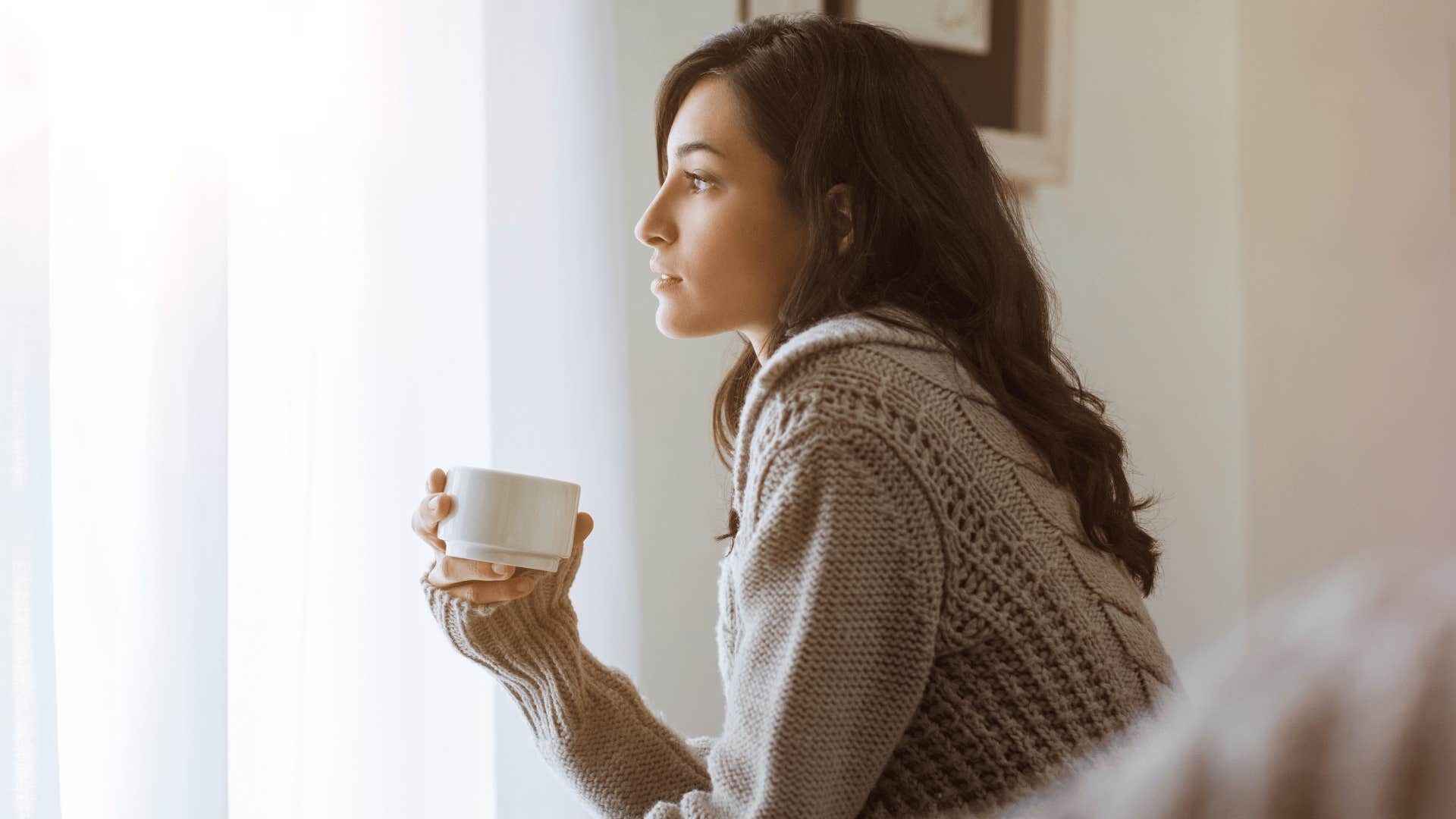 woman reflecting patterns make relationship stronger juno retrograde 2025