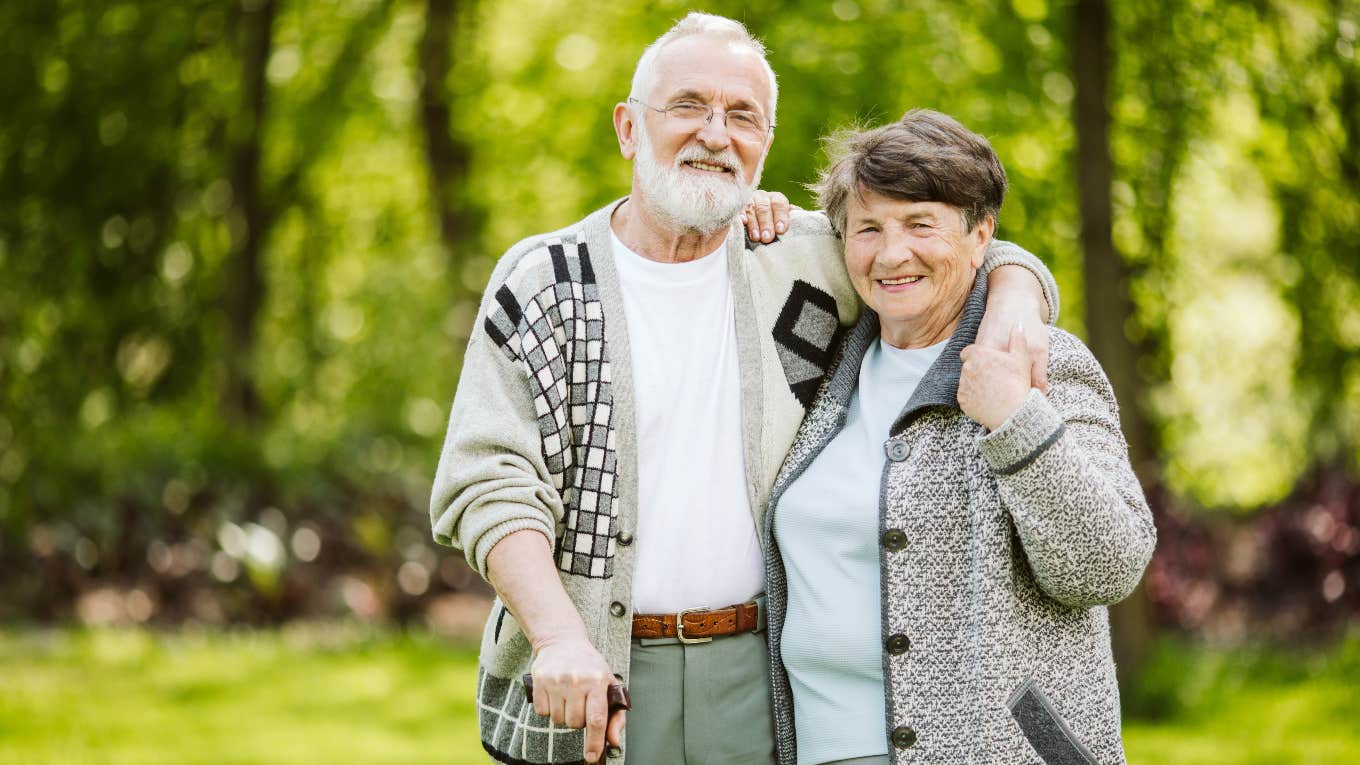 elderly couple in renter's new apartment complex