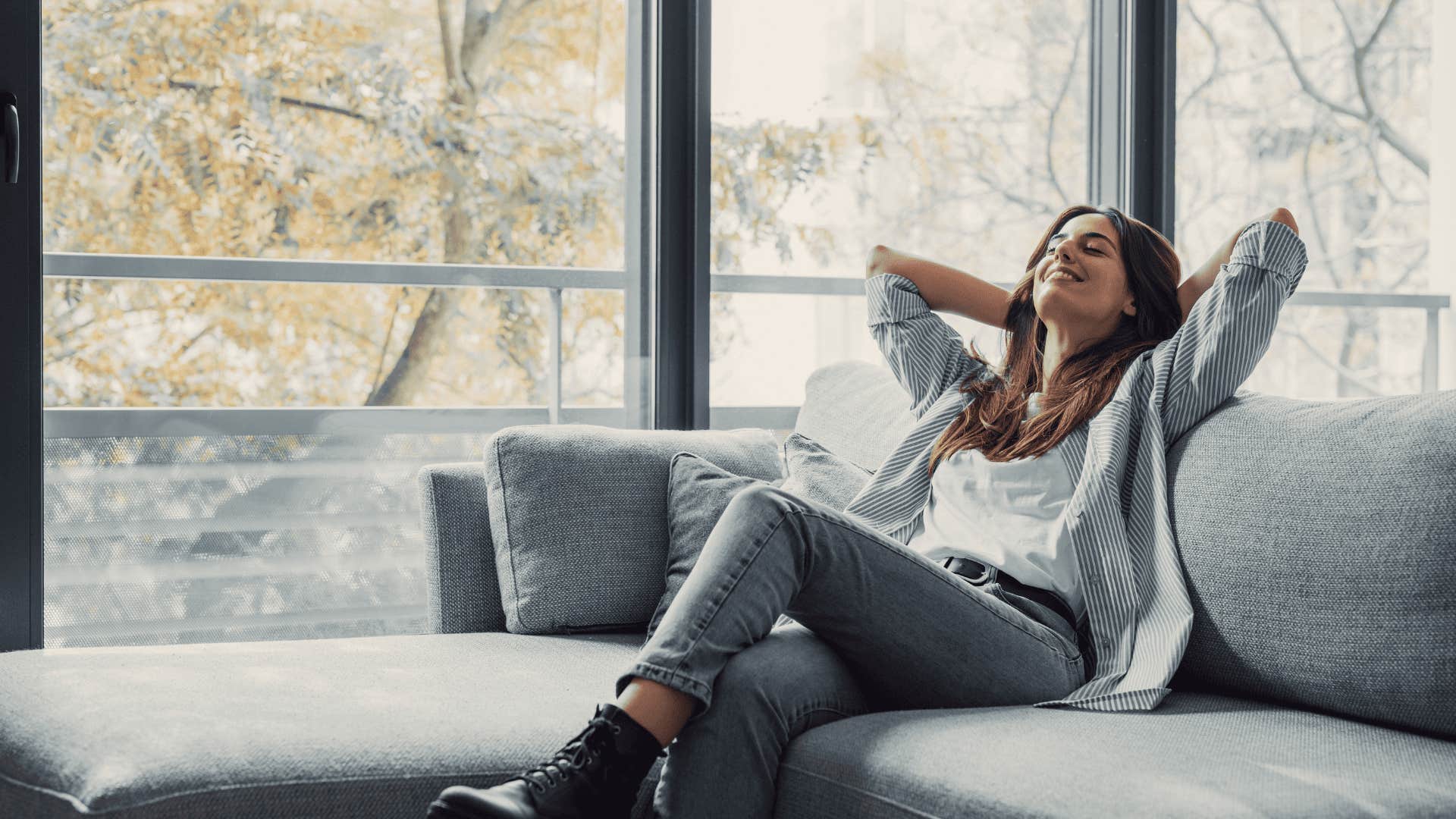 woman who is scared to go all in relaxing at home