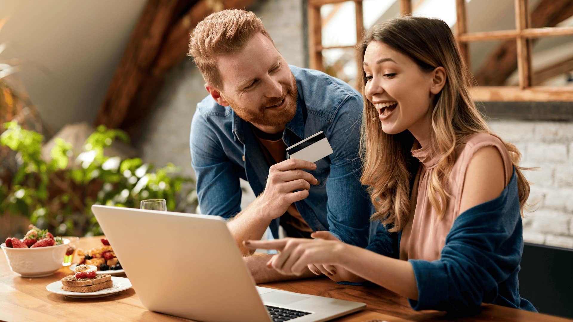 couple using their credit card