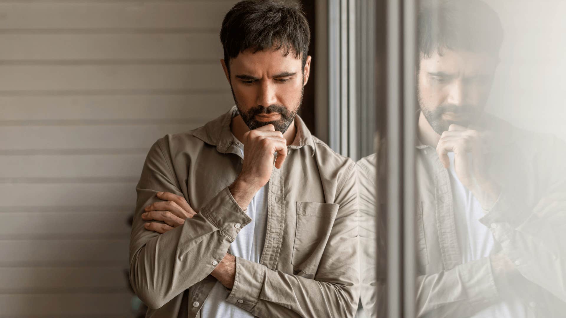 man reflecting on his past