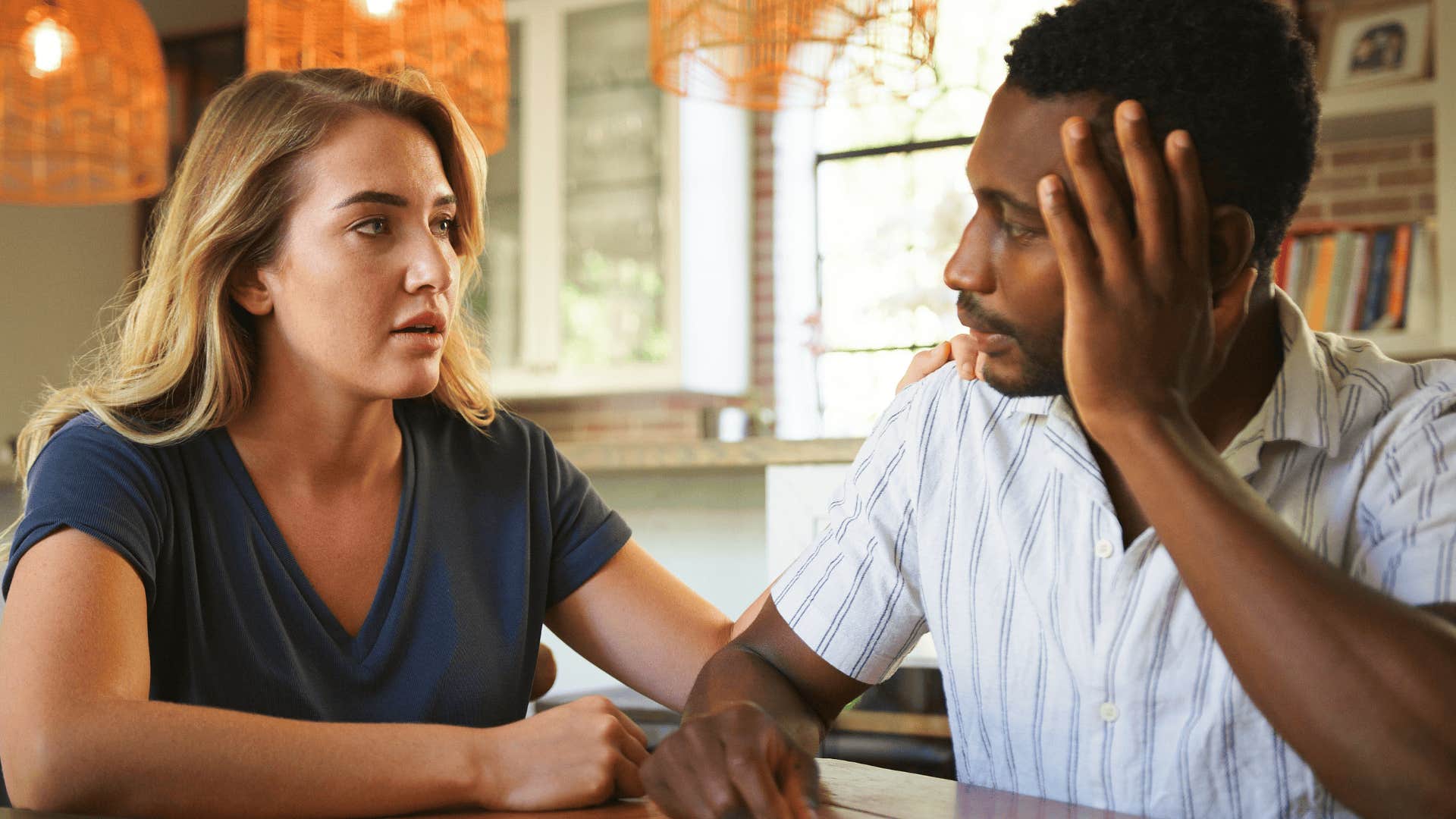 upset couple looking at each other