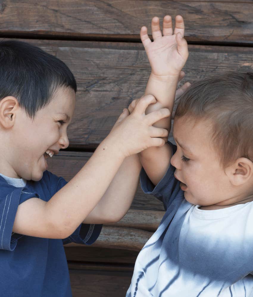Older brother taunts younger sibling