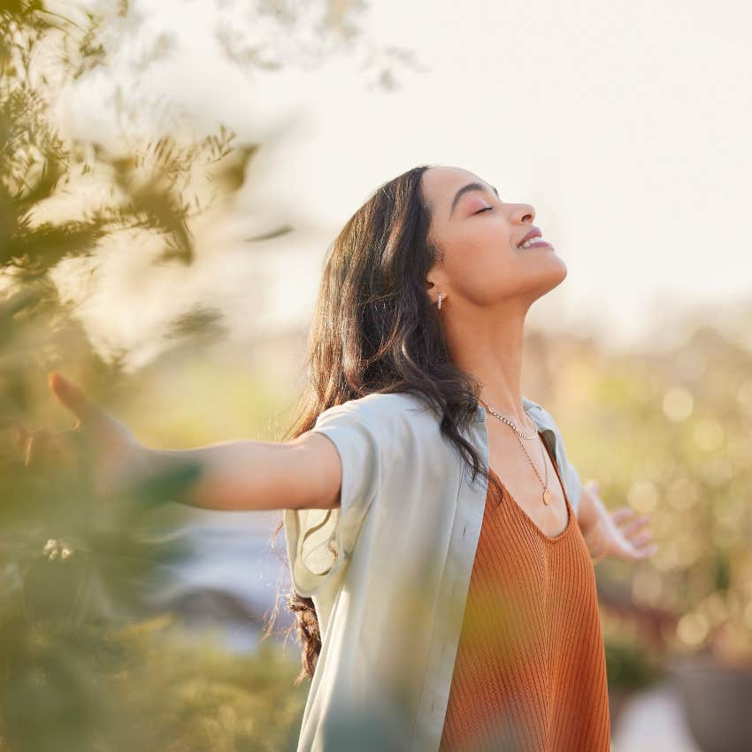 codependent woman smiling outside