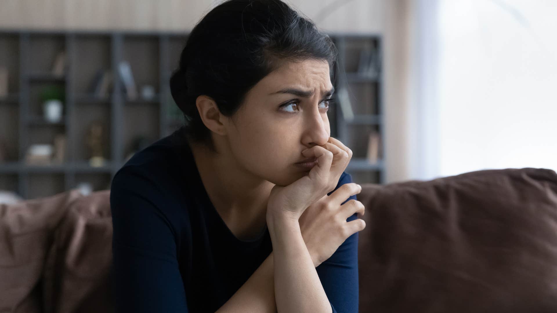 stressed woman thinking about long-term investments