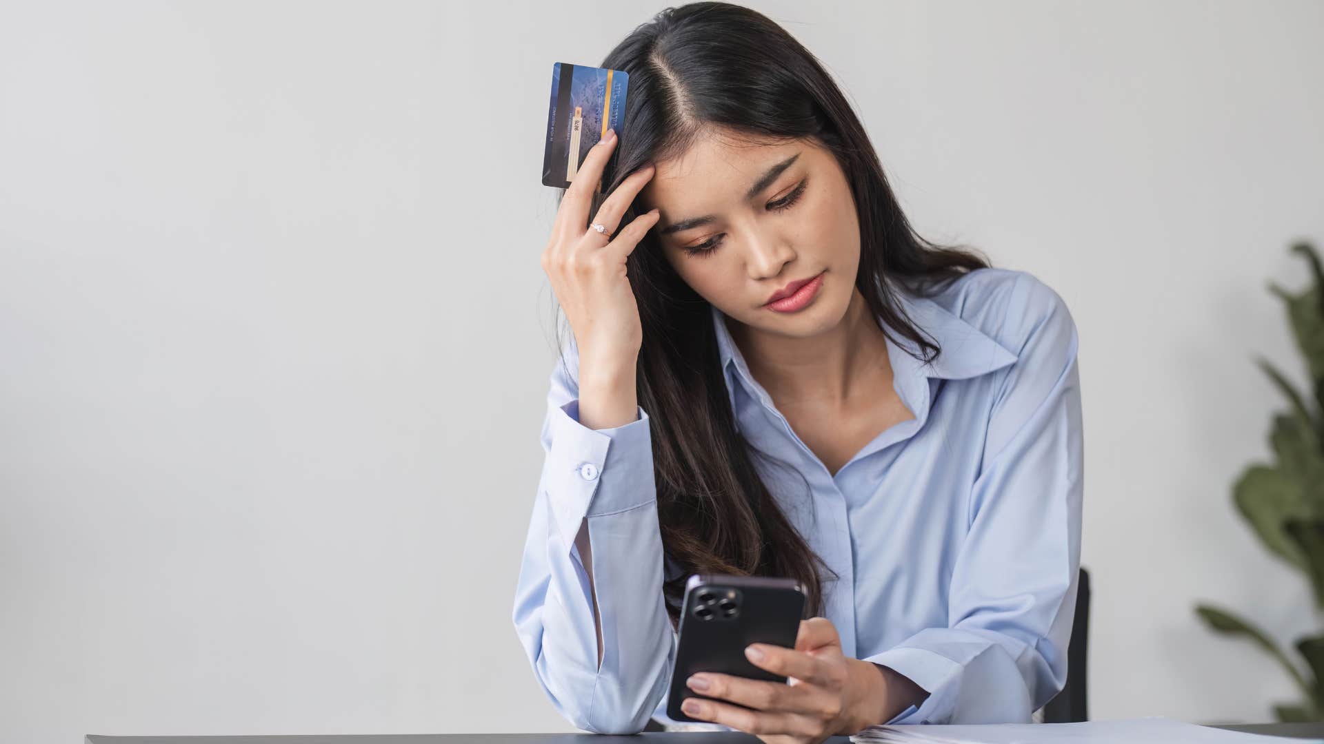 woman feeling pressured to punish herself for spending money