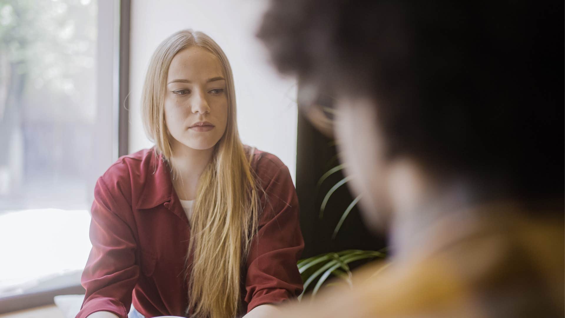 woman realizes that her friend is jealous and always competing with her