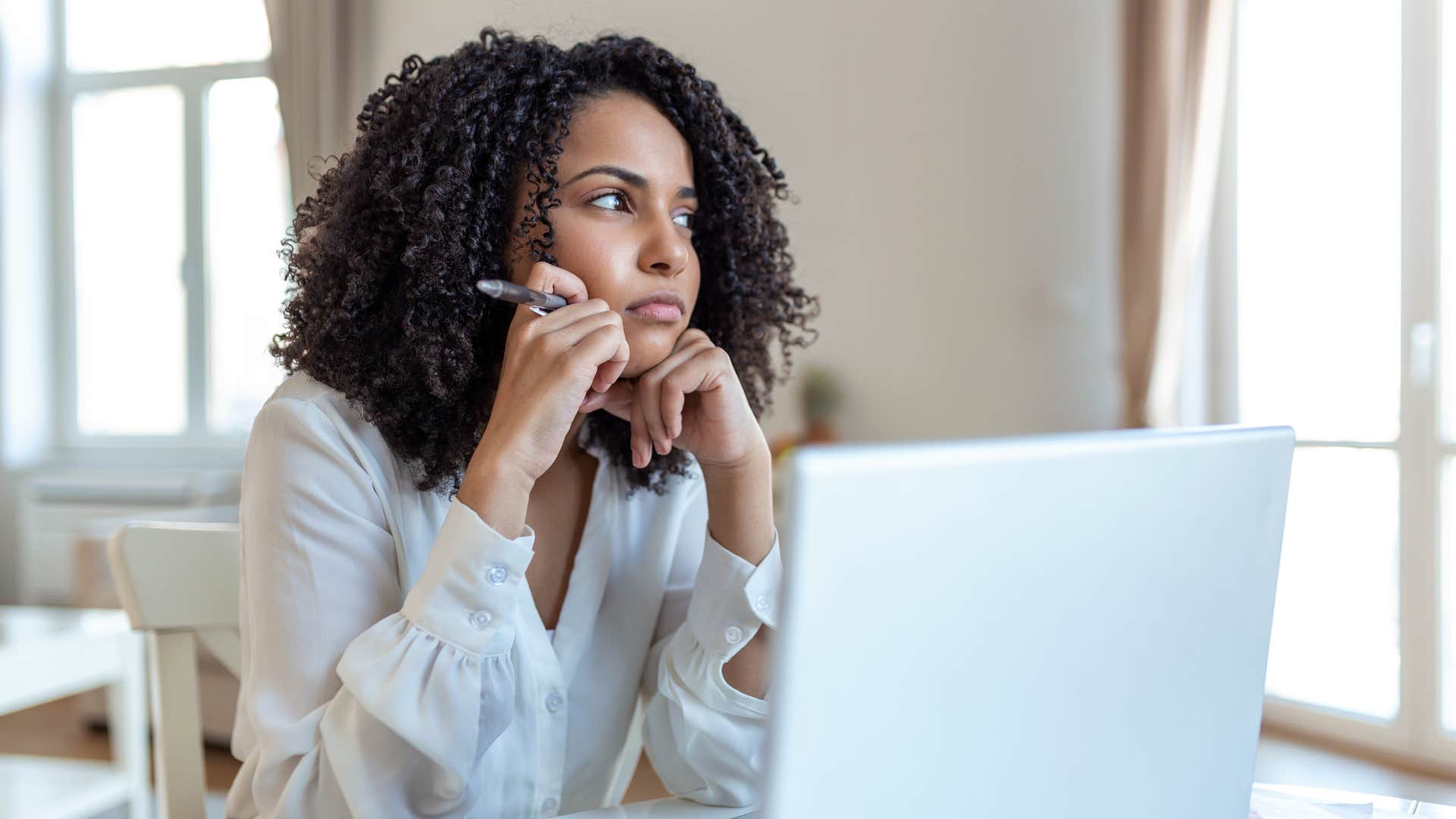 woman can’t concentrate on work and feels stuck and stagnant