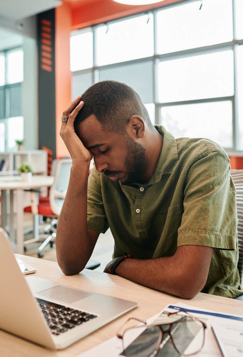 man overloaded economic pressure sign quiet cracking