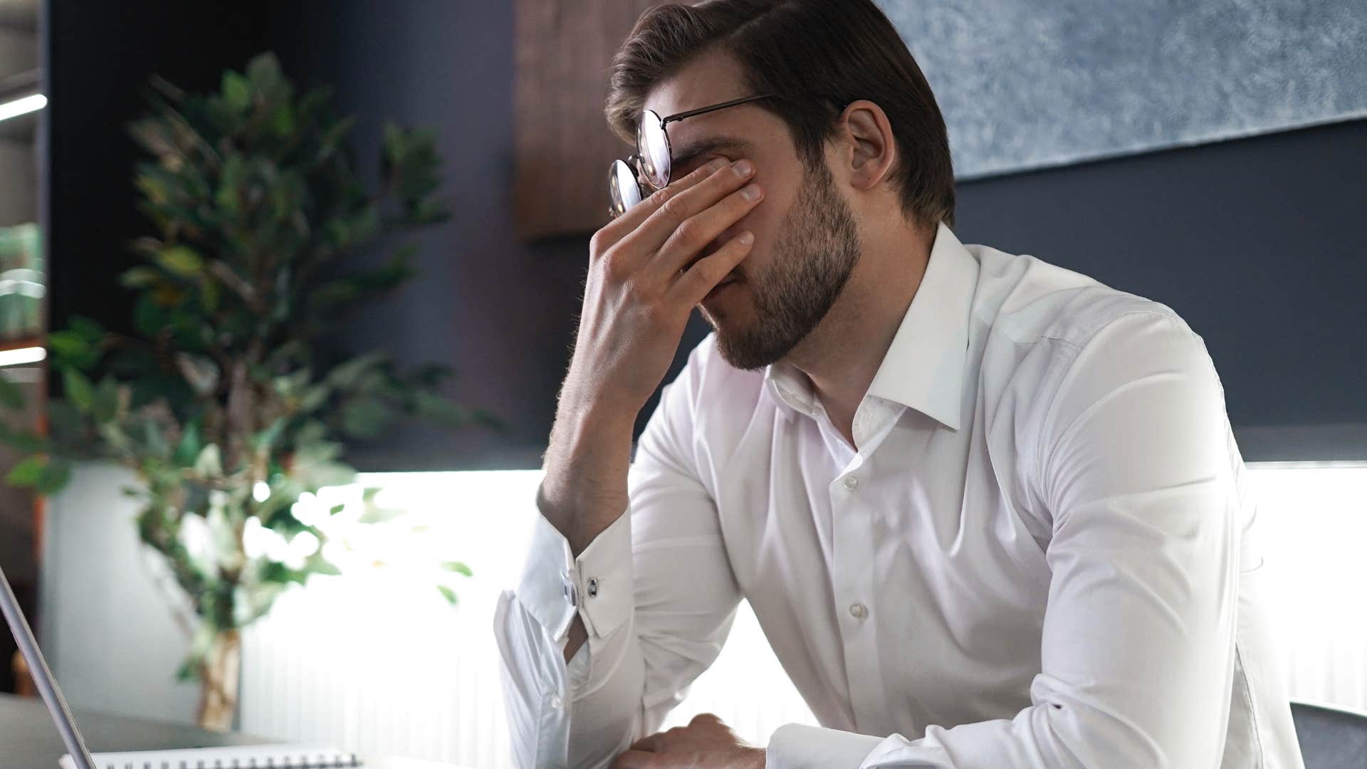 stressed man noticing his productivity declining