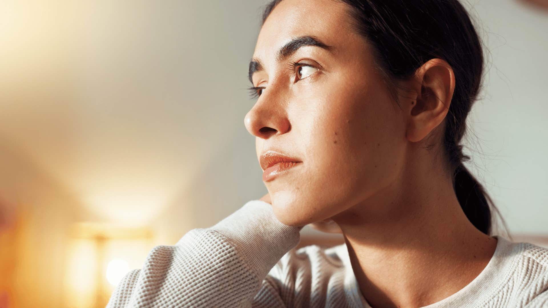 A woman lives in the past and contemplates her choices.