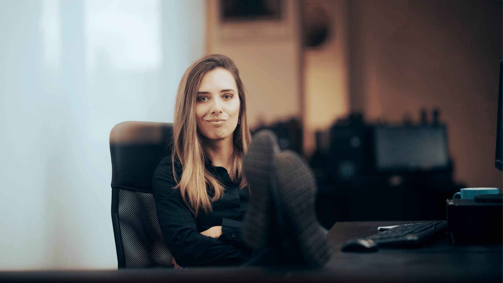 A woman procrastinates at her job.