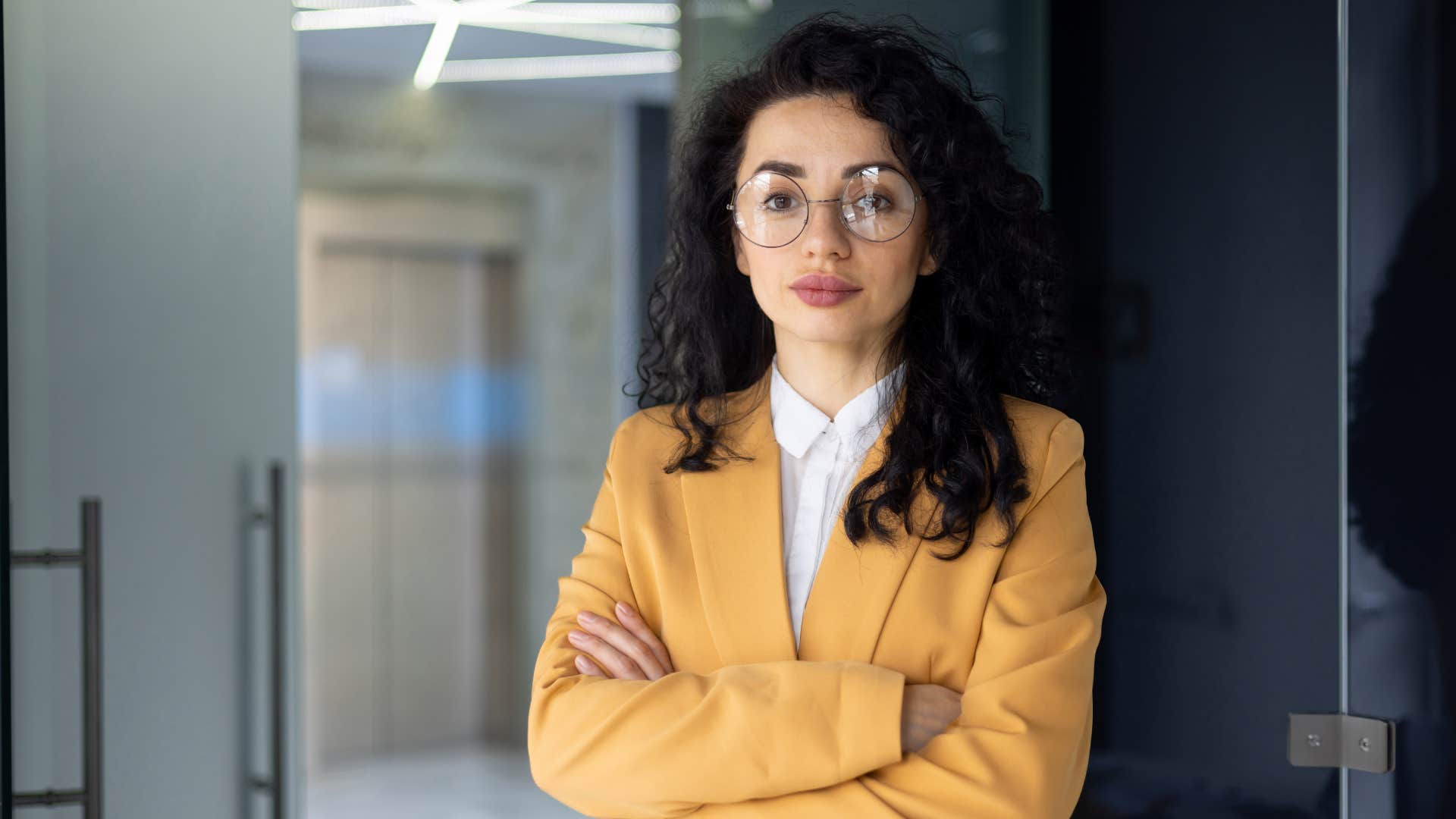 professional woman displaying closed off body language