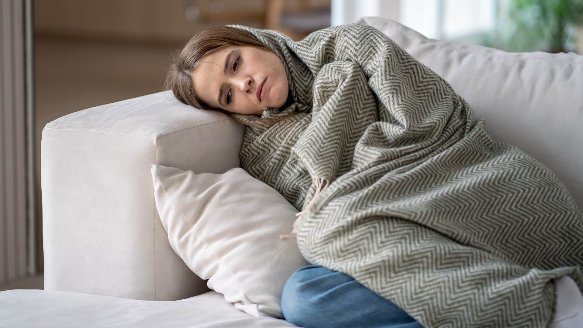 upset woman feeling emotionally drained after social interaction