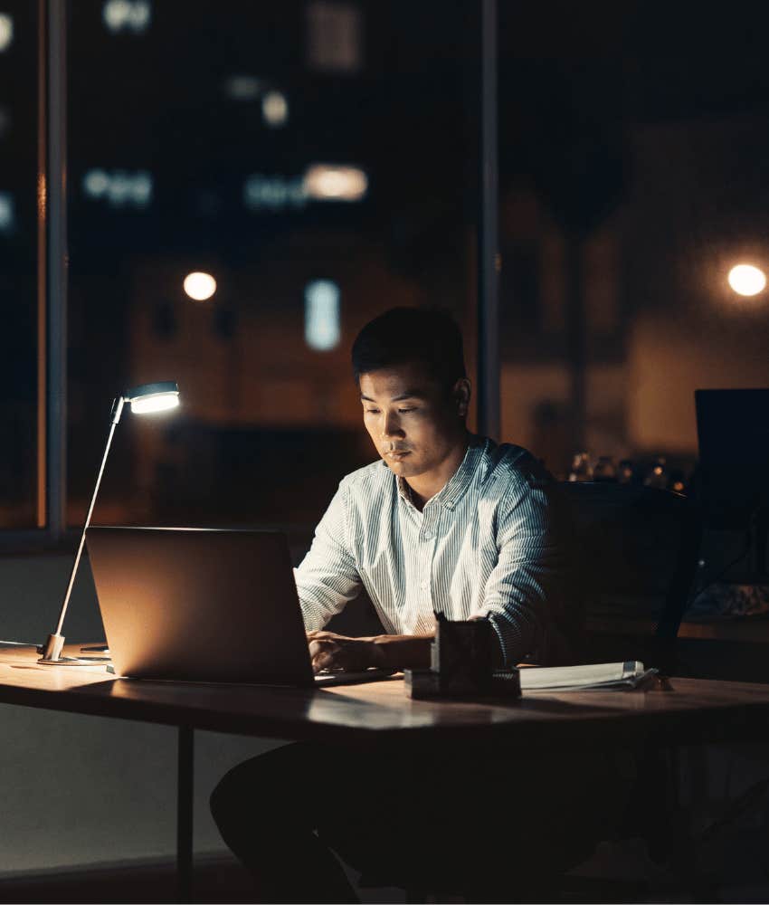overworked man working outside scheduled hours
