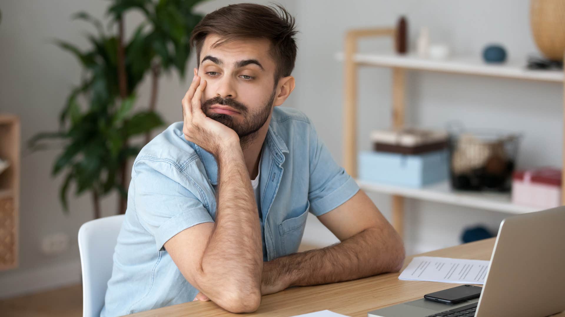 man looking uninterested in trying anything new