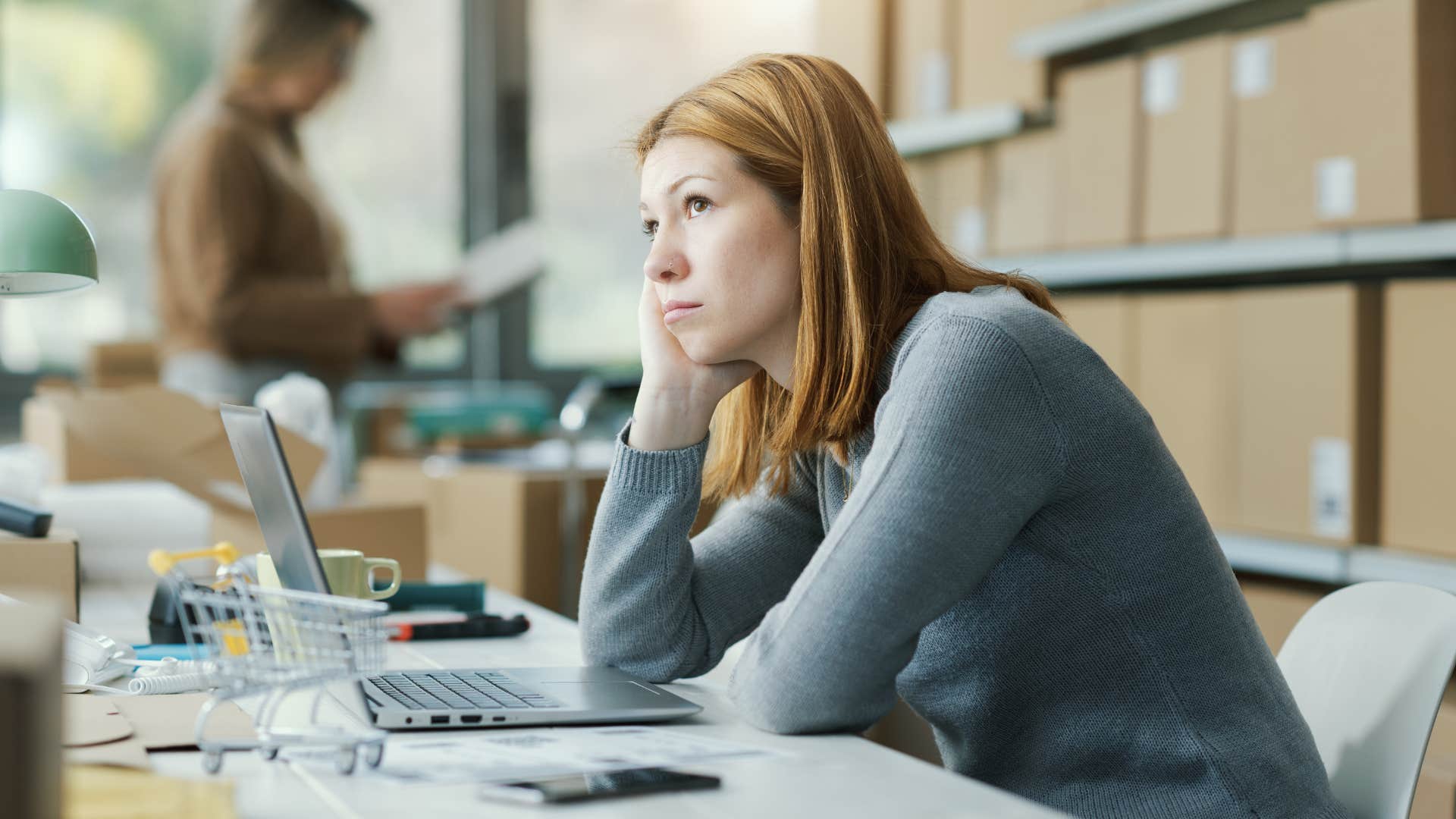 disinterested woman with no excitement about her future daydreaming