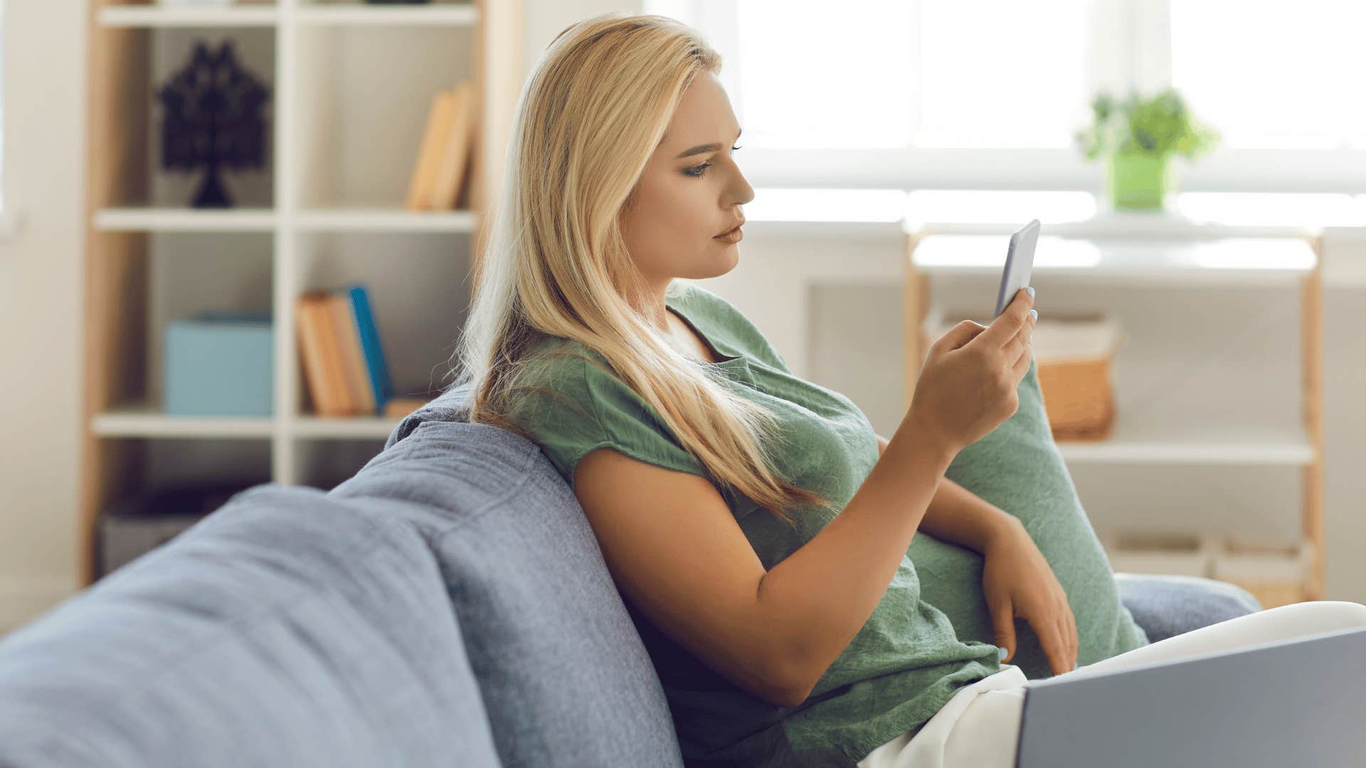 woman looking at her phone but not texting