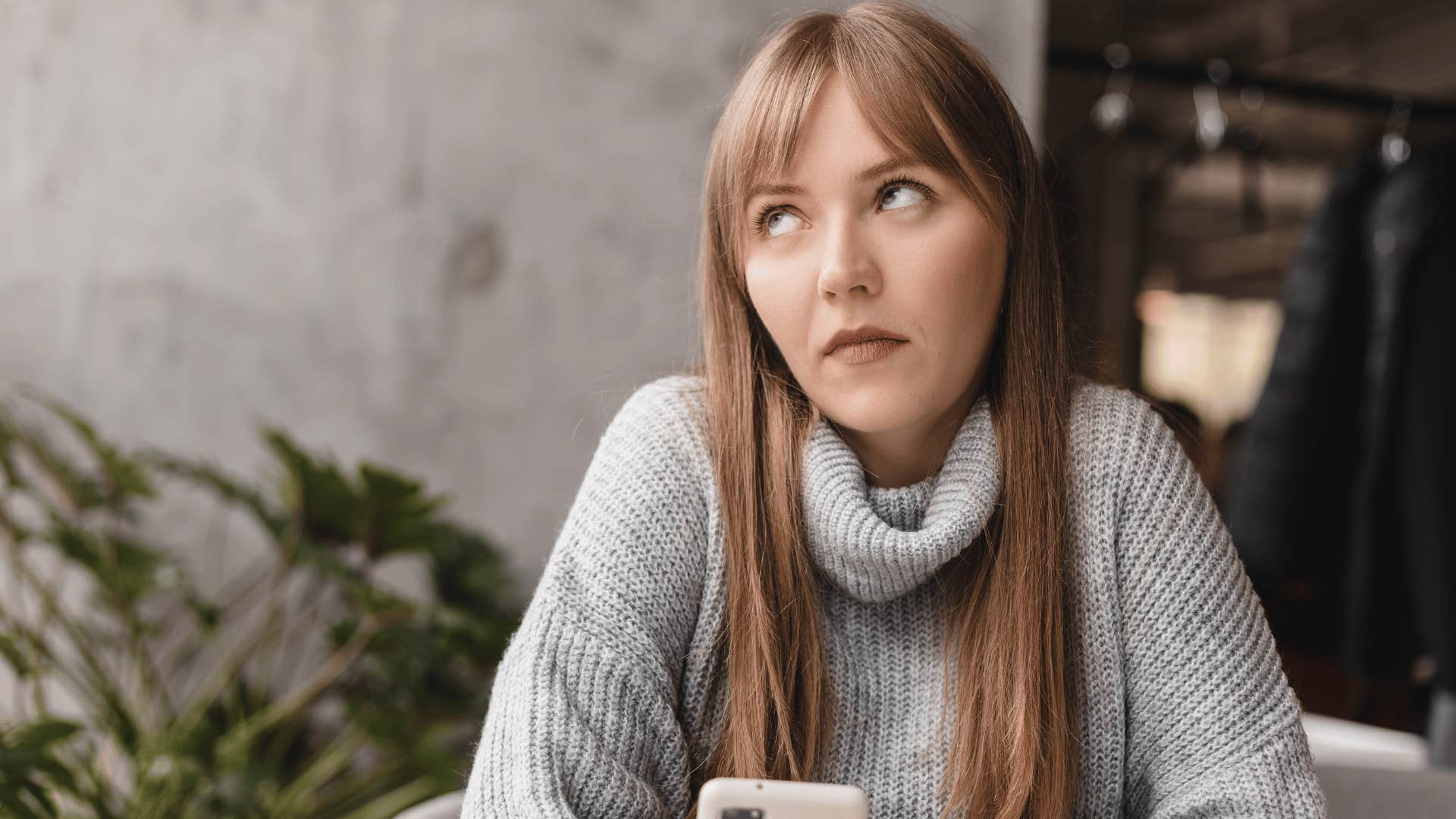 woman rolling her eyes not being grateful