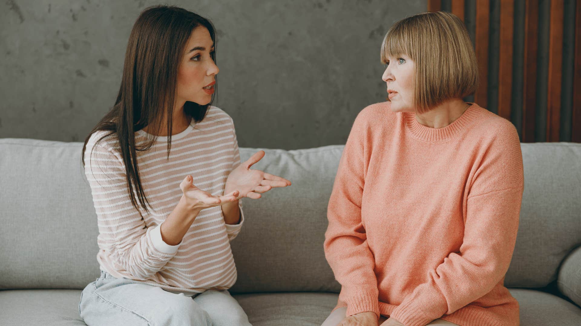 woman being argumentative with mom about her past