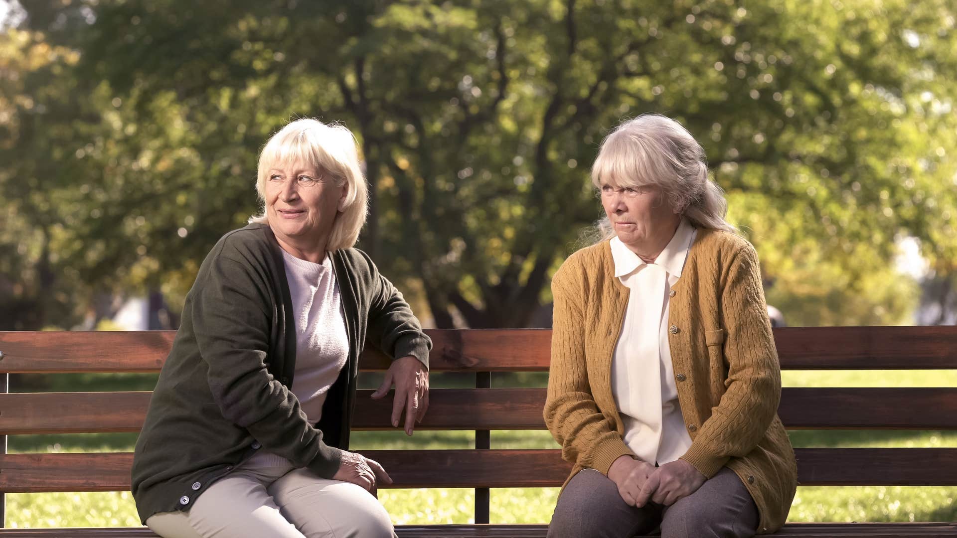 jealous woman silently judging her friend
