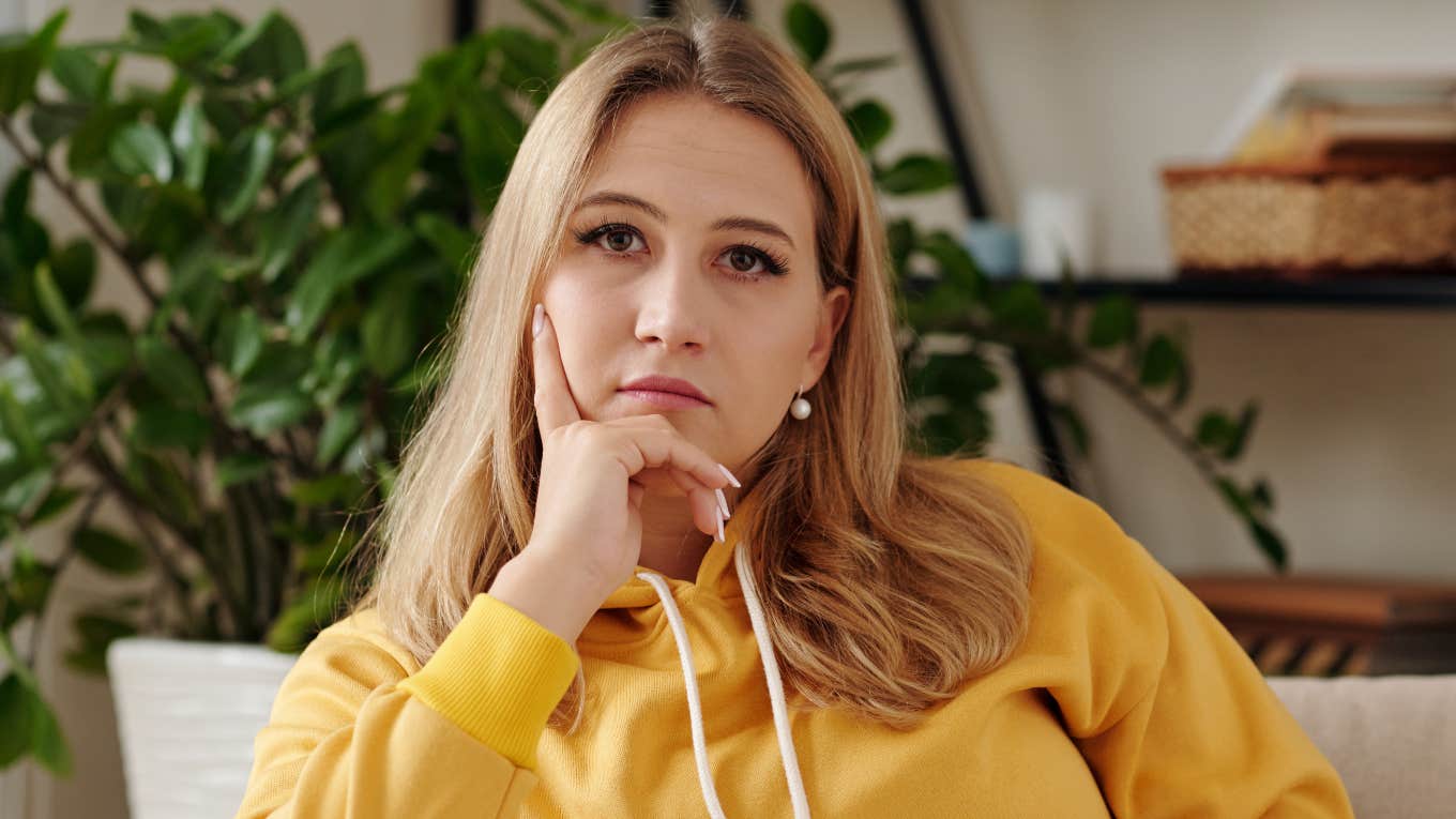 serious jealous woman staring ahead