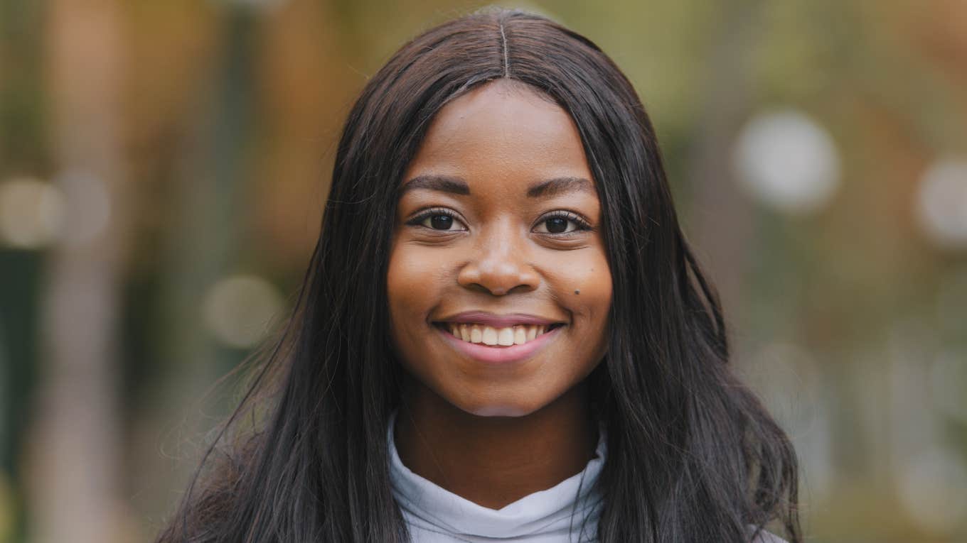 woman smiling looking forward to a more beautiful life