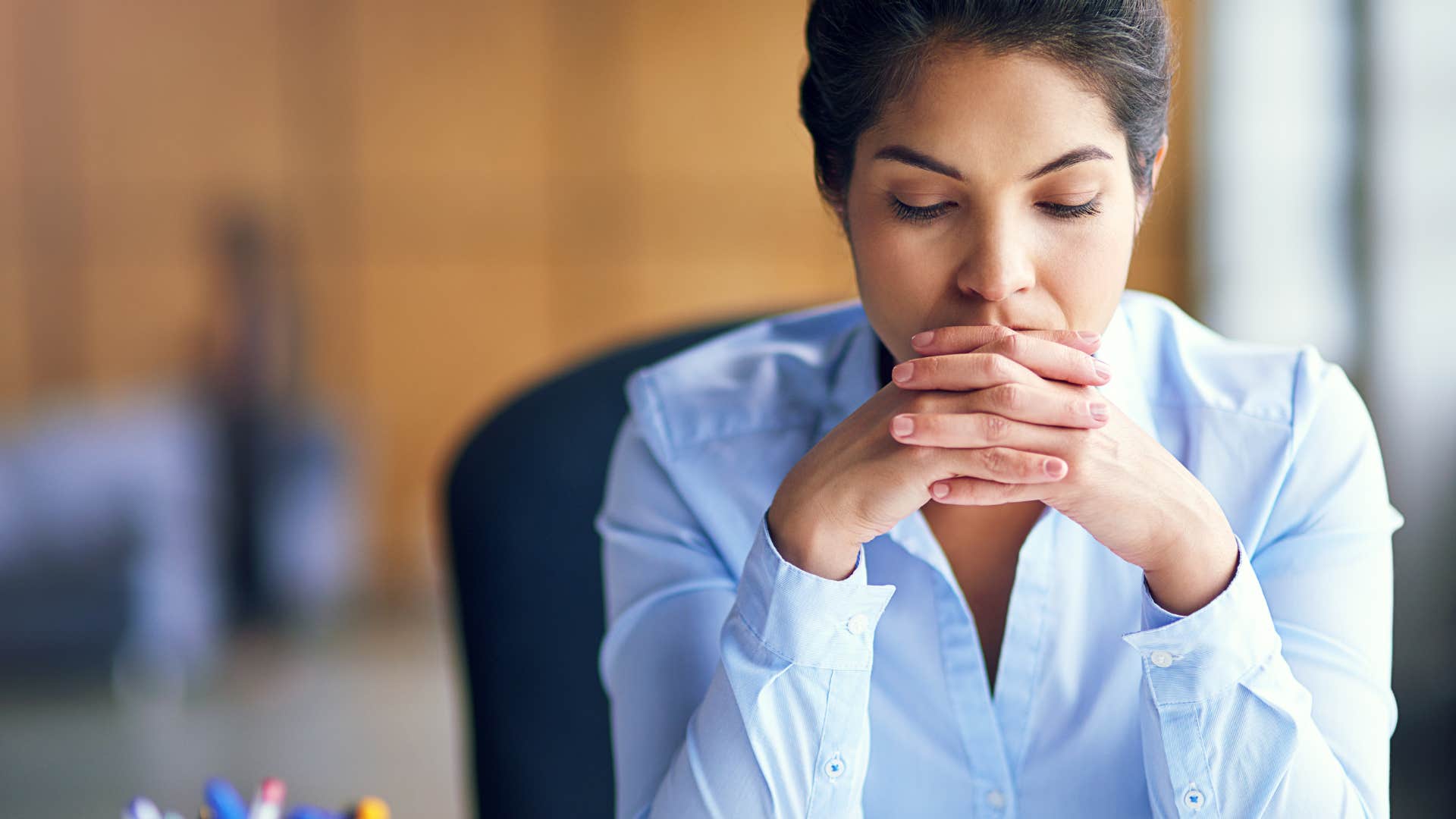 frustrated employee sitting at desk
