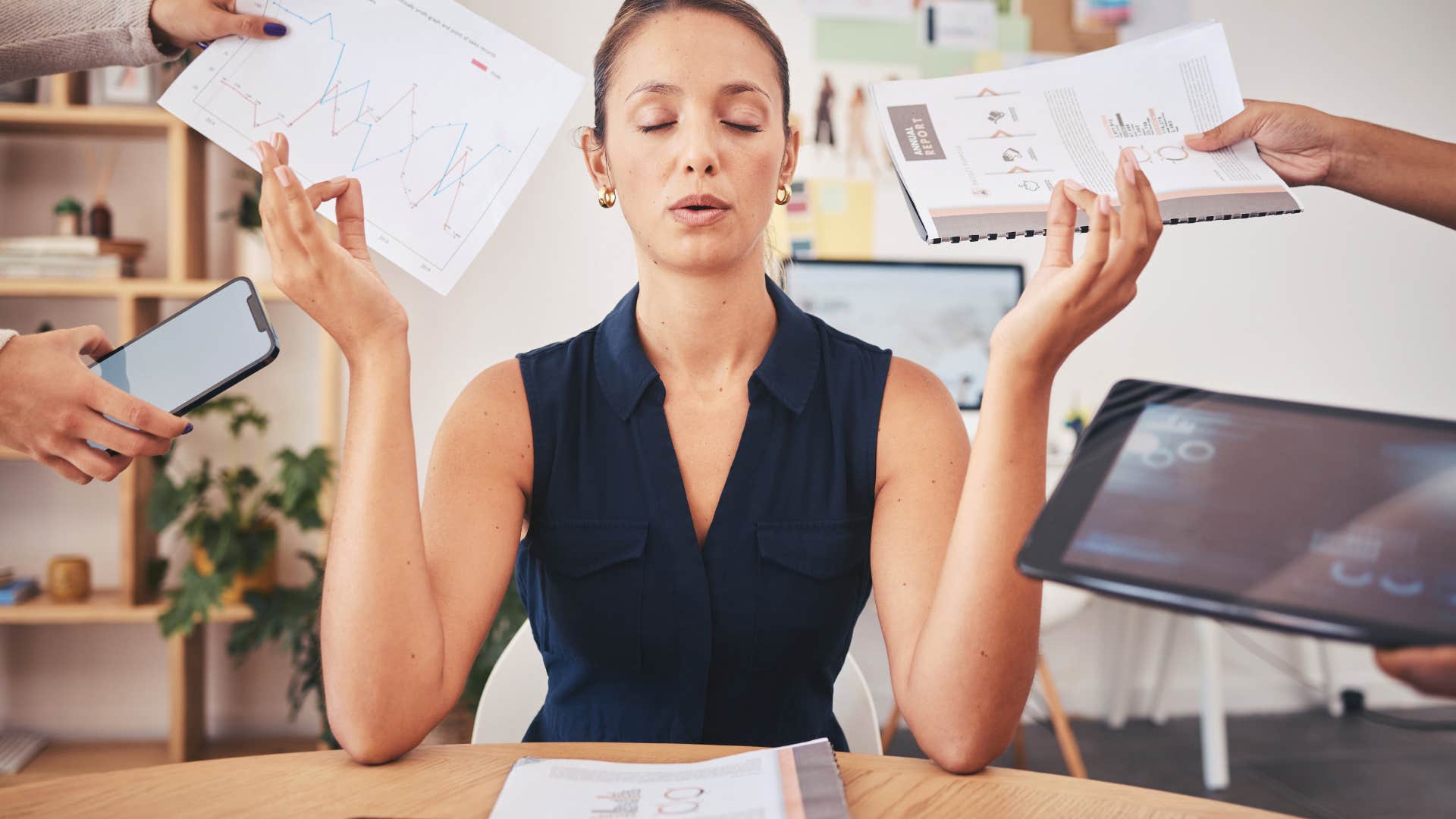 stressed out employee being handed other people's work