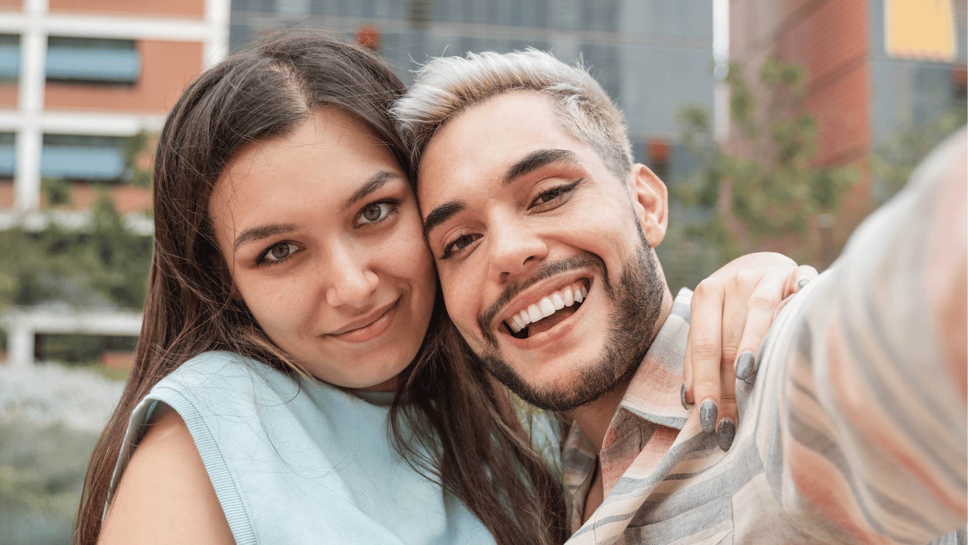 Sister and brother sneak away from family gathering to take a selfie