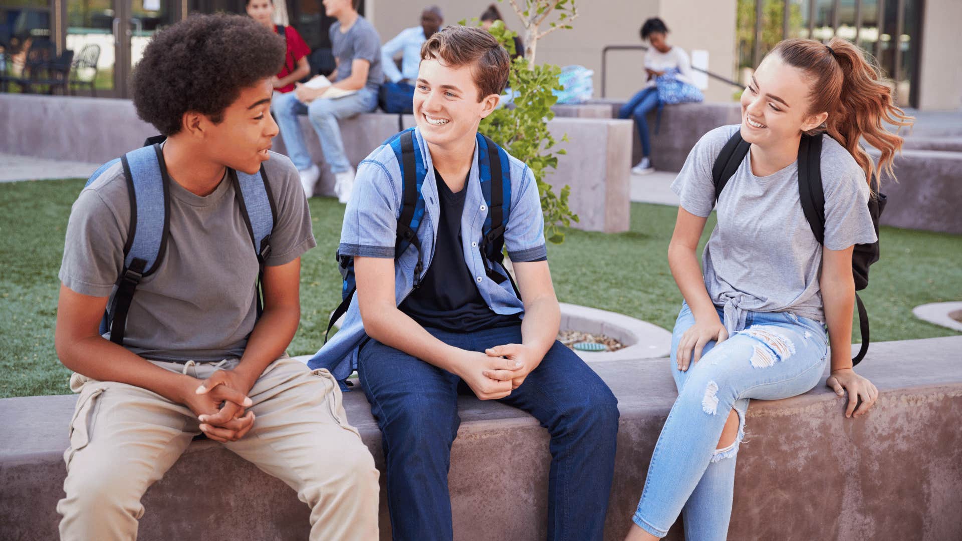 Three teens chat a nd teach each other about brothers and sisters