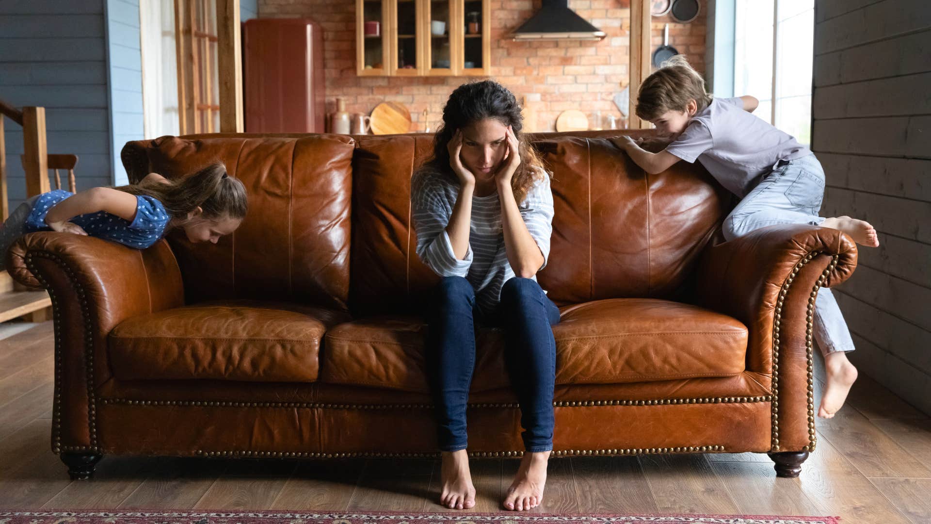 mother feeling overwhelmed and lazy with her kids
