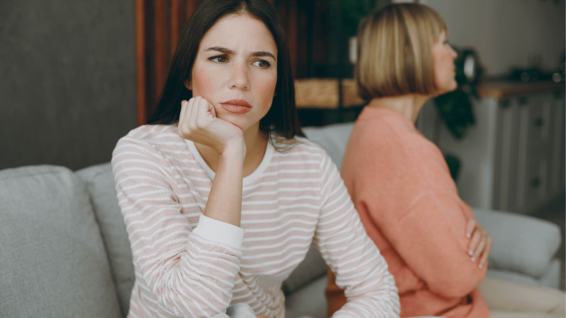 Upset woman notices when someone oversteps her boundaries