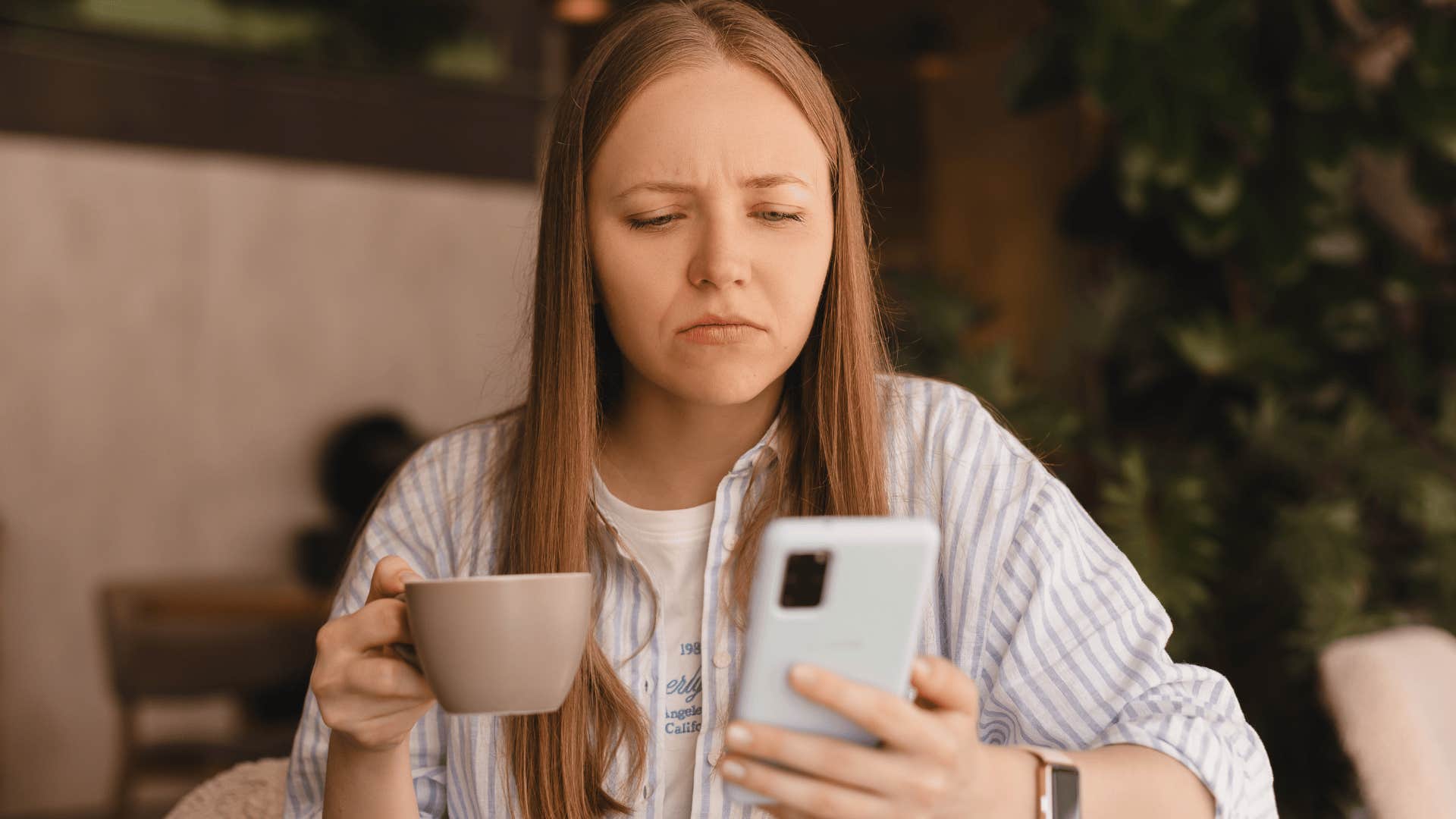 Woman who keeps up with the news to stay informed about the world