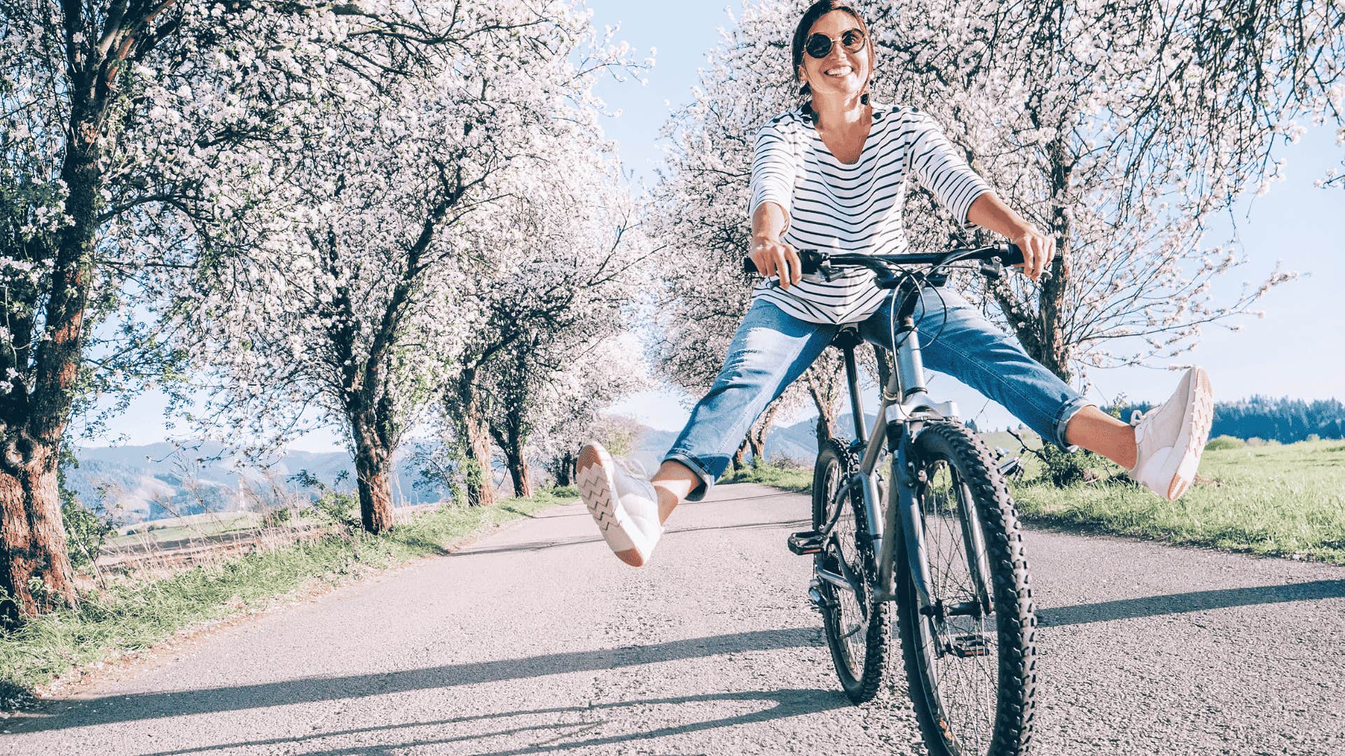 woman on a bike with life hack that gives her edge over gen-z